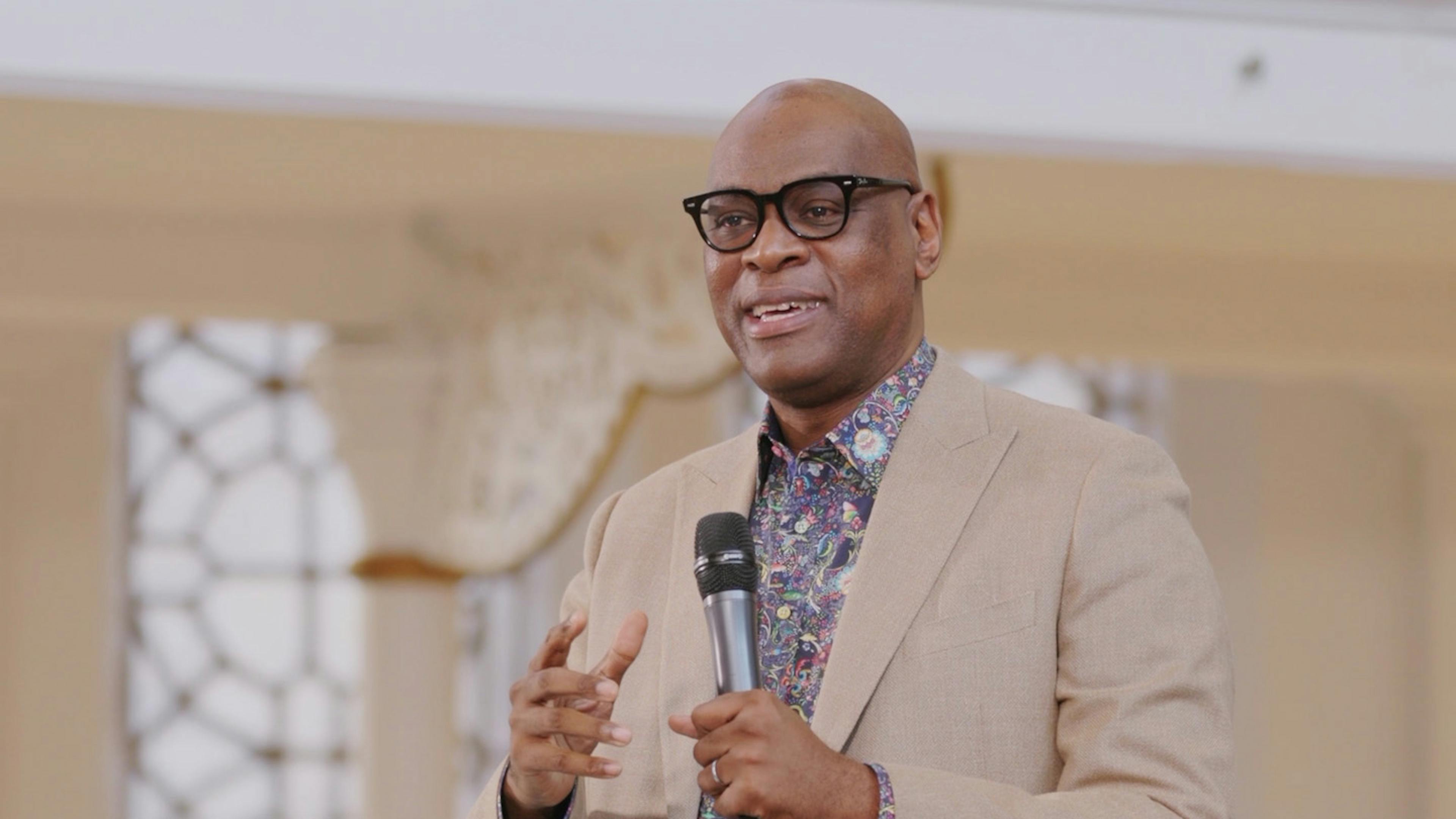 A screen capture of pastor Agu Irukwu's talk. He is speaking to the audience. 