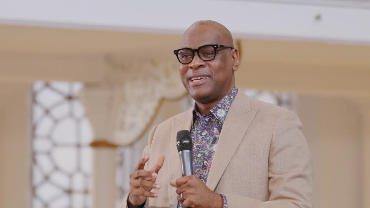A screen capture of pastor Agu Irukwu's talk. He is speaking to the audience. 