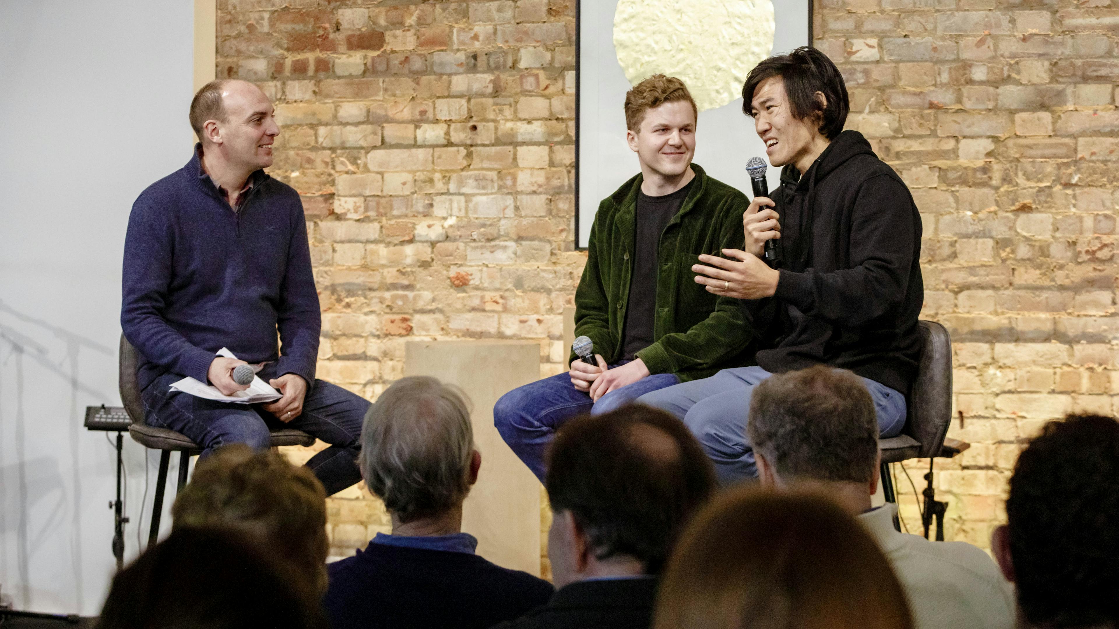 Two business men being interviewed