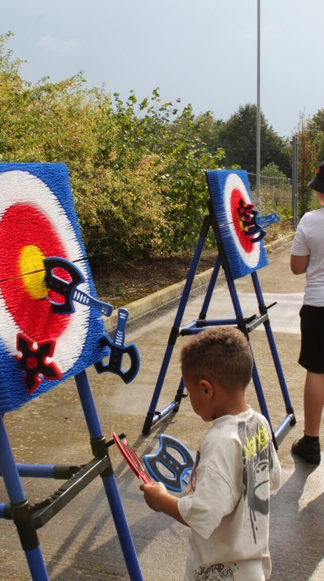 A photo from the Exactaform Family Day showing a child playing a game