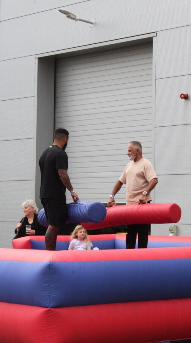 A photo from the Exactaform Family Day showing people playing a game