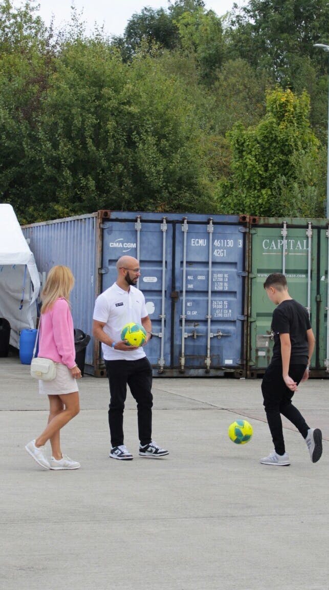 A photo from the Exactaform family day showing people playing a game