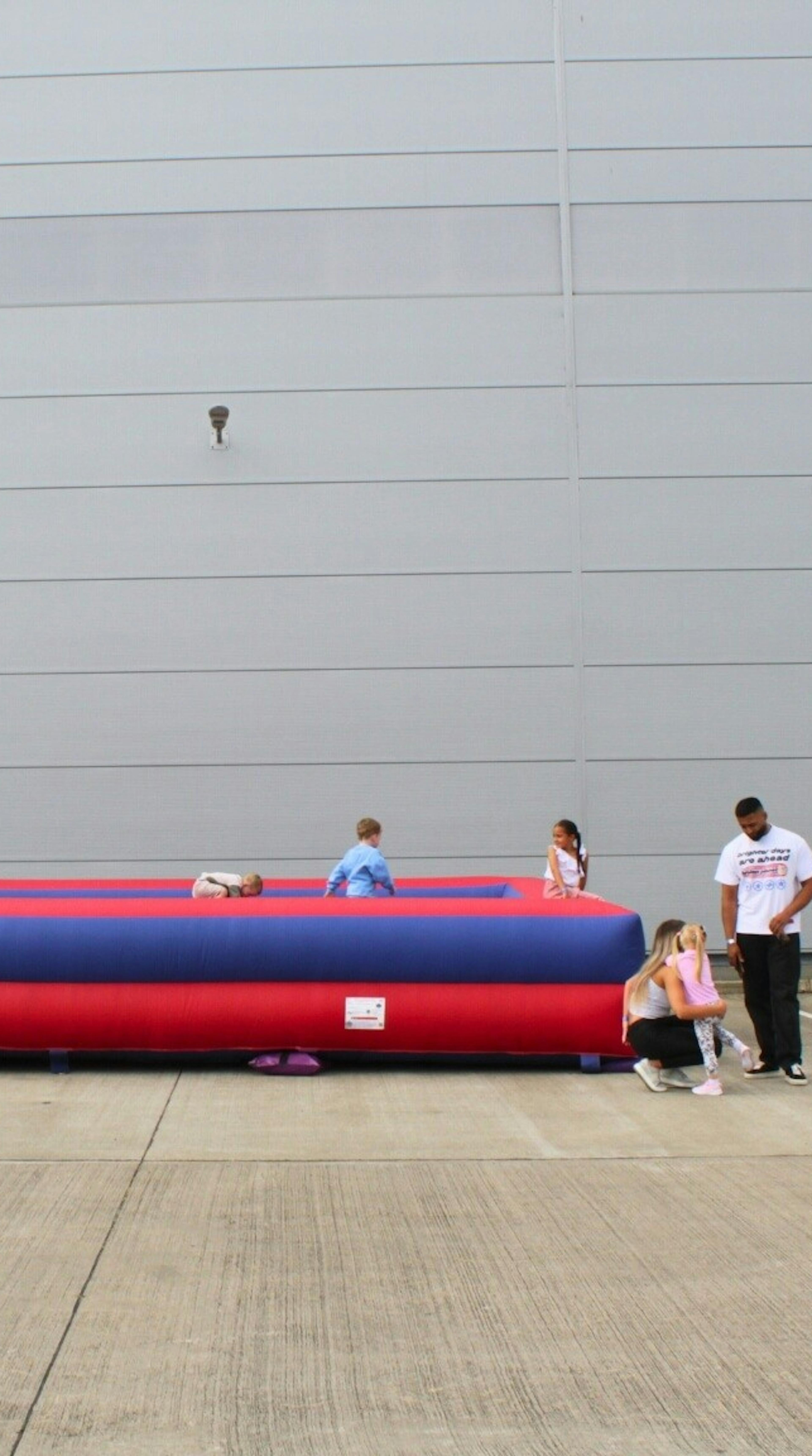 A photo from the Exactaform Family Day showing children playing a game