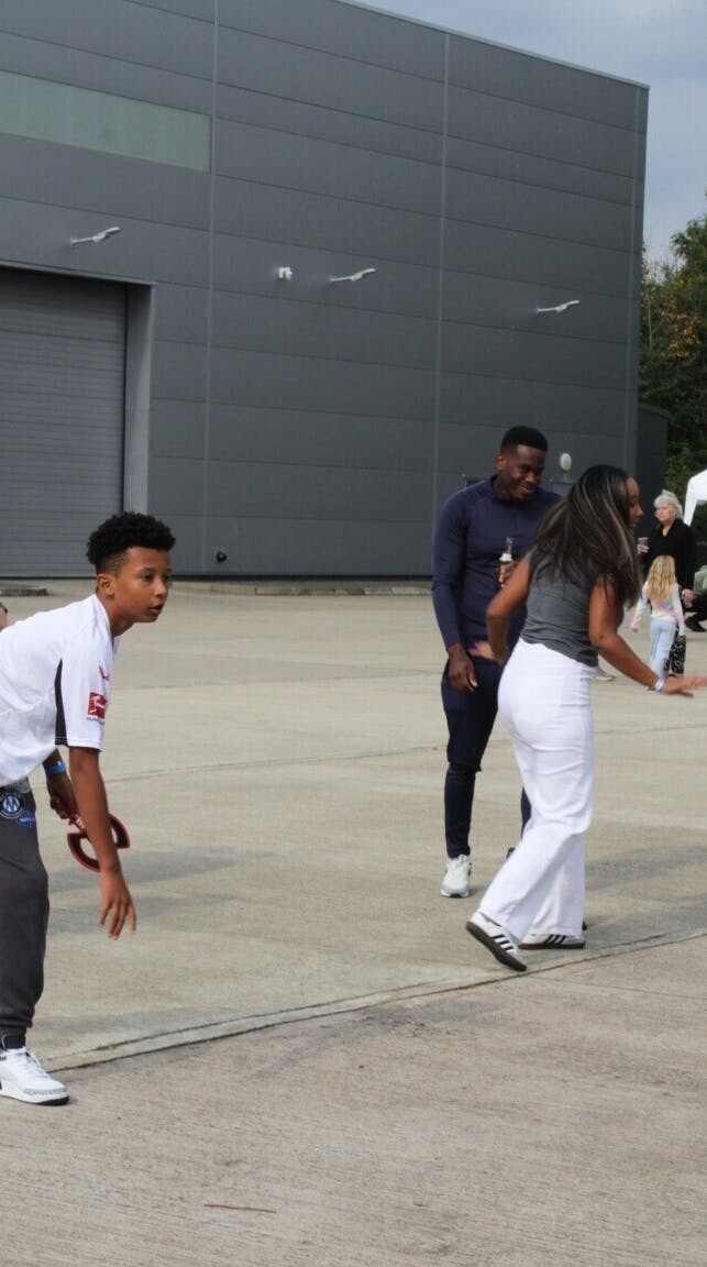 A photo from the Exactaform Family Day showing a child playing a game