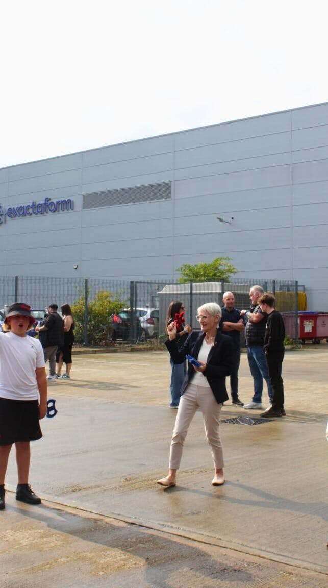 A photo from the Exactaform Family Day showing people outside the Exactaform offices.