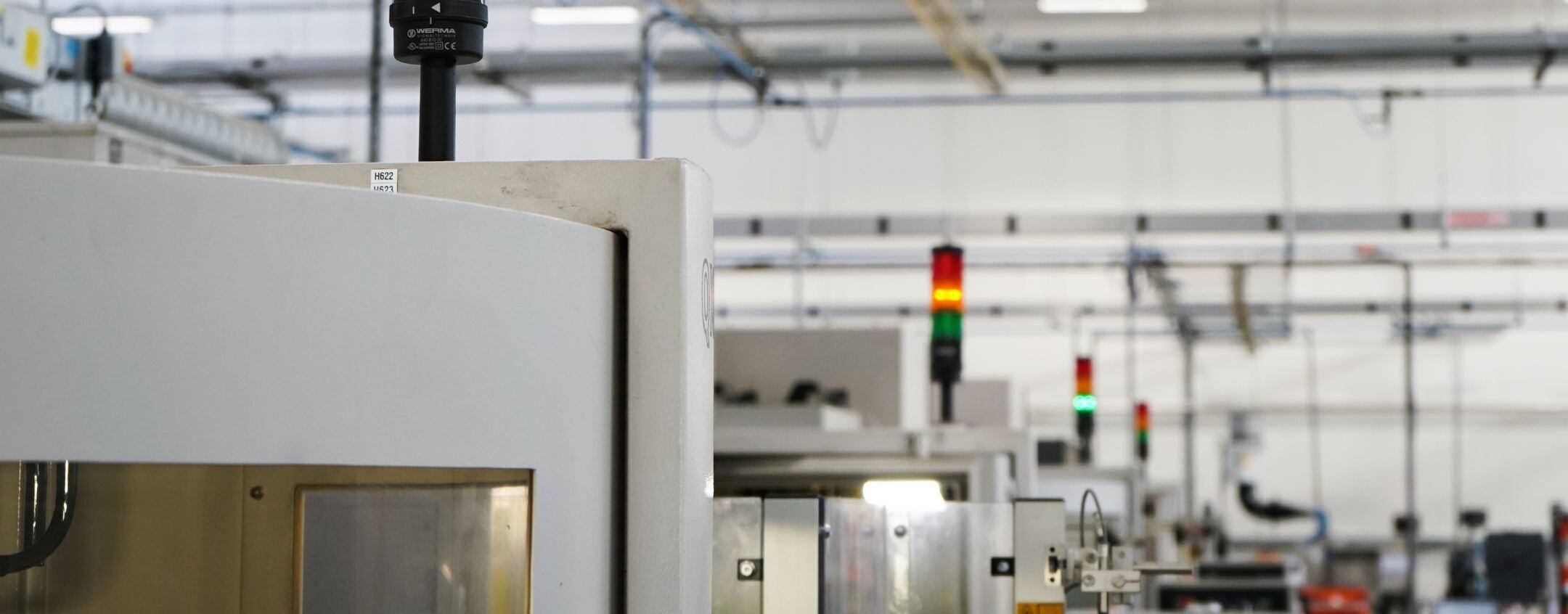 The tops of machines within the Exactaform facility
