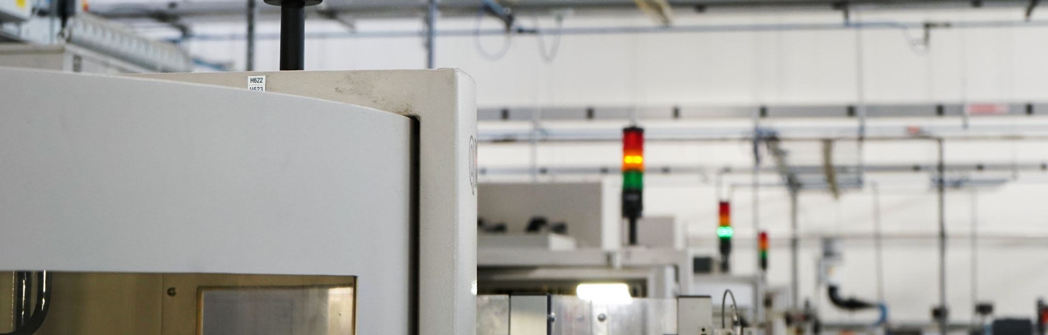 The tops of machines within the Exactaform facility