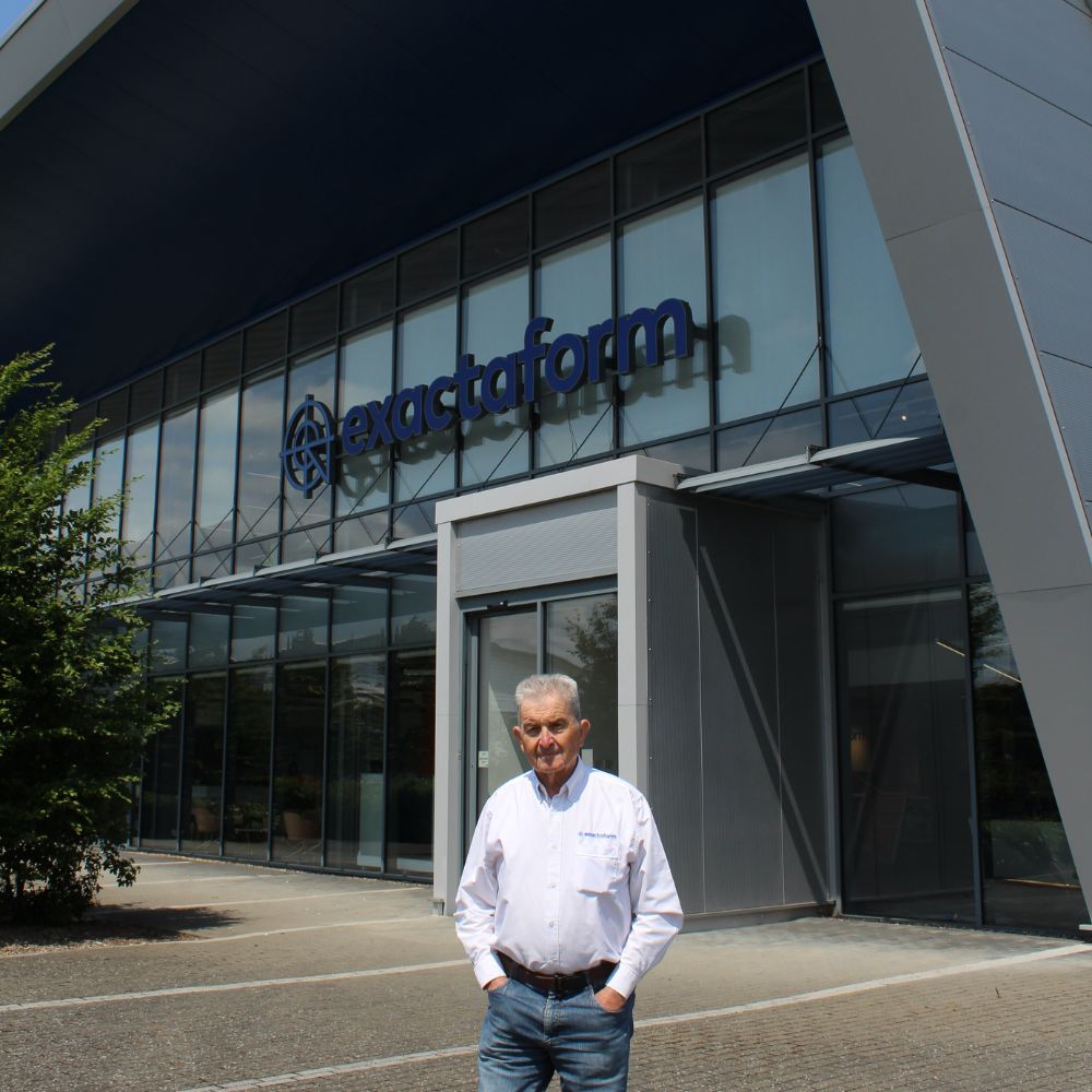 John Inglis in front of the Exactaform building