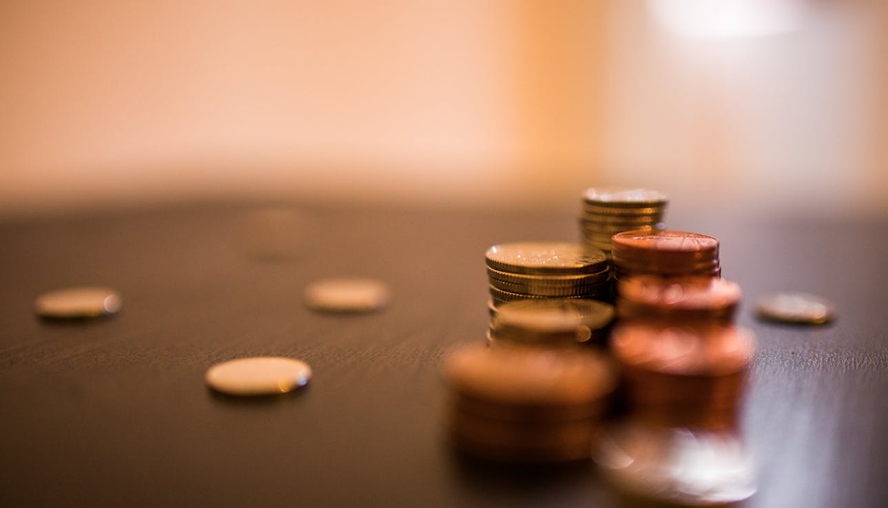 Coins on table - finance and file management.