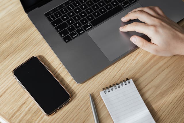 Laptop and mobile phone for authentication.