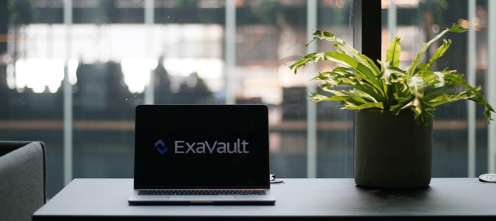 Laptop with logo for ExaVault FTP service.