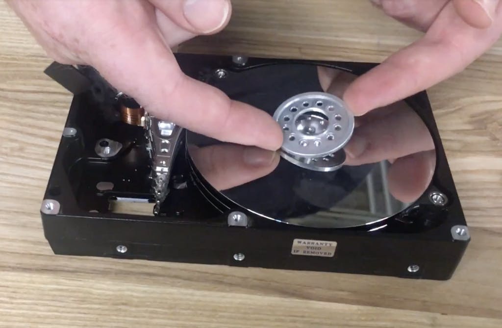 Hard drive dissection - removing platters.