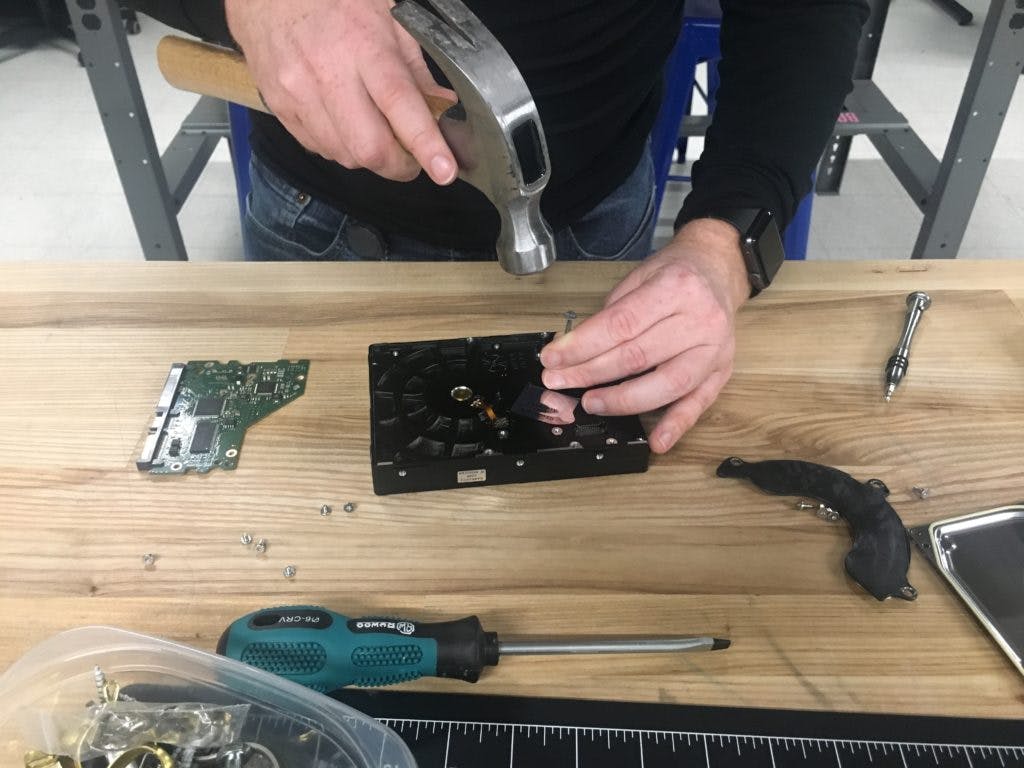 Removing hard drive compression mount.