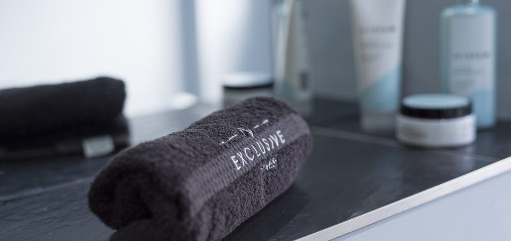 Exclusive fitness towel on counter top