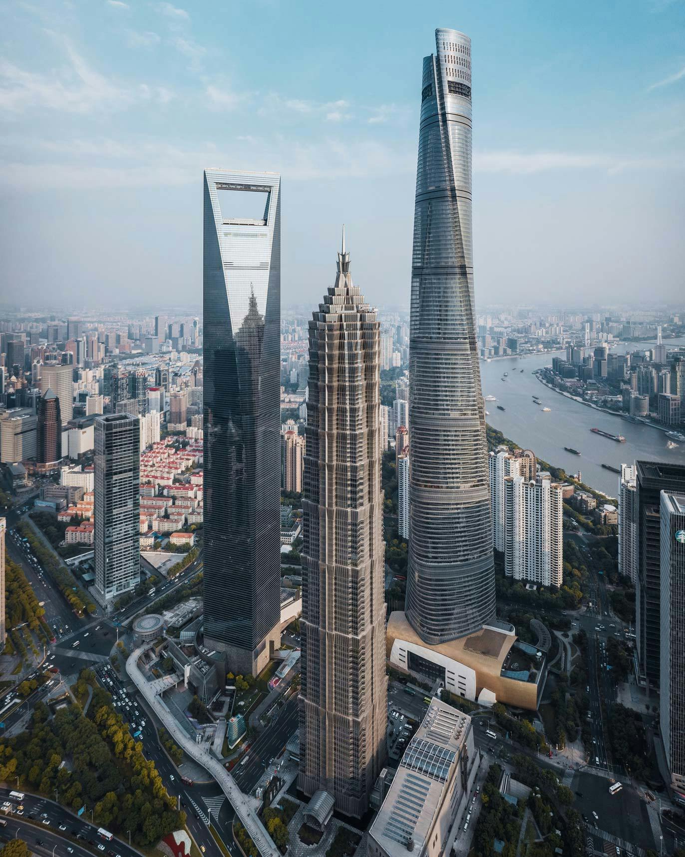 Shanghai World Financial Center, Jin Mao Tower & Shanghai Tower from lawn at Foxxconn Building