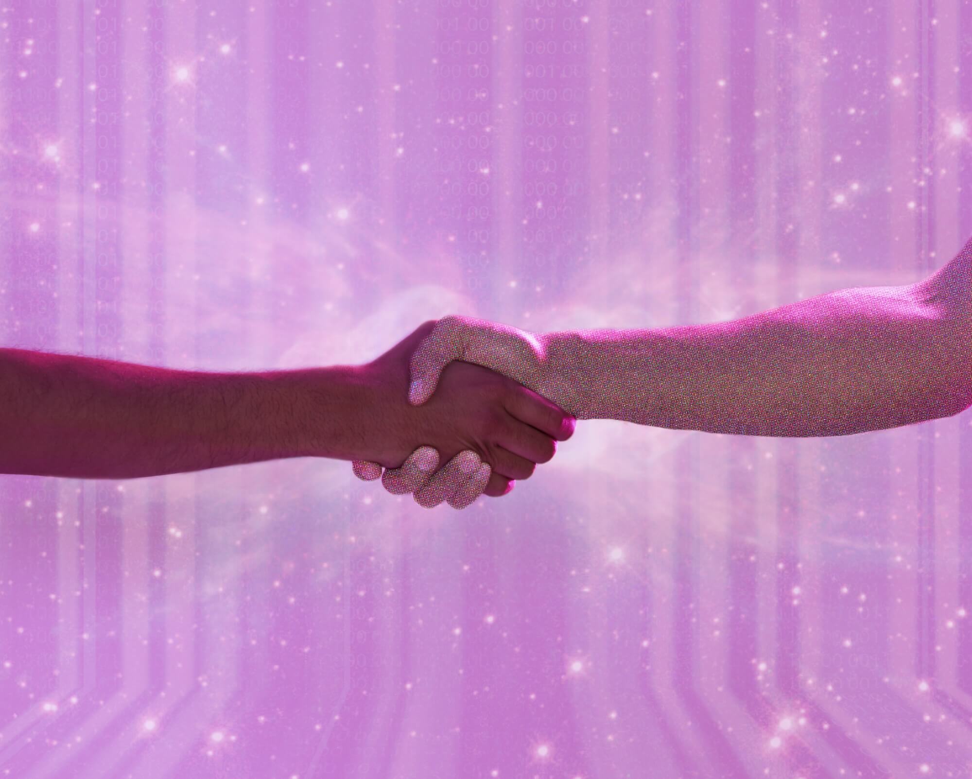 Handschlag vor pinkem Hintergrund
