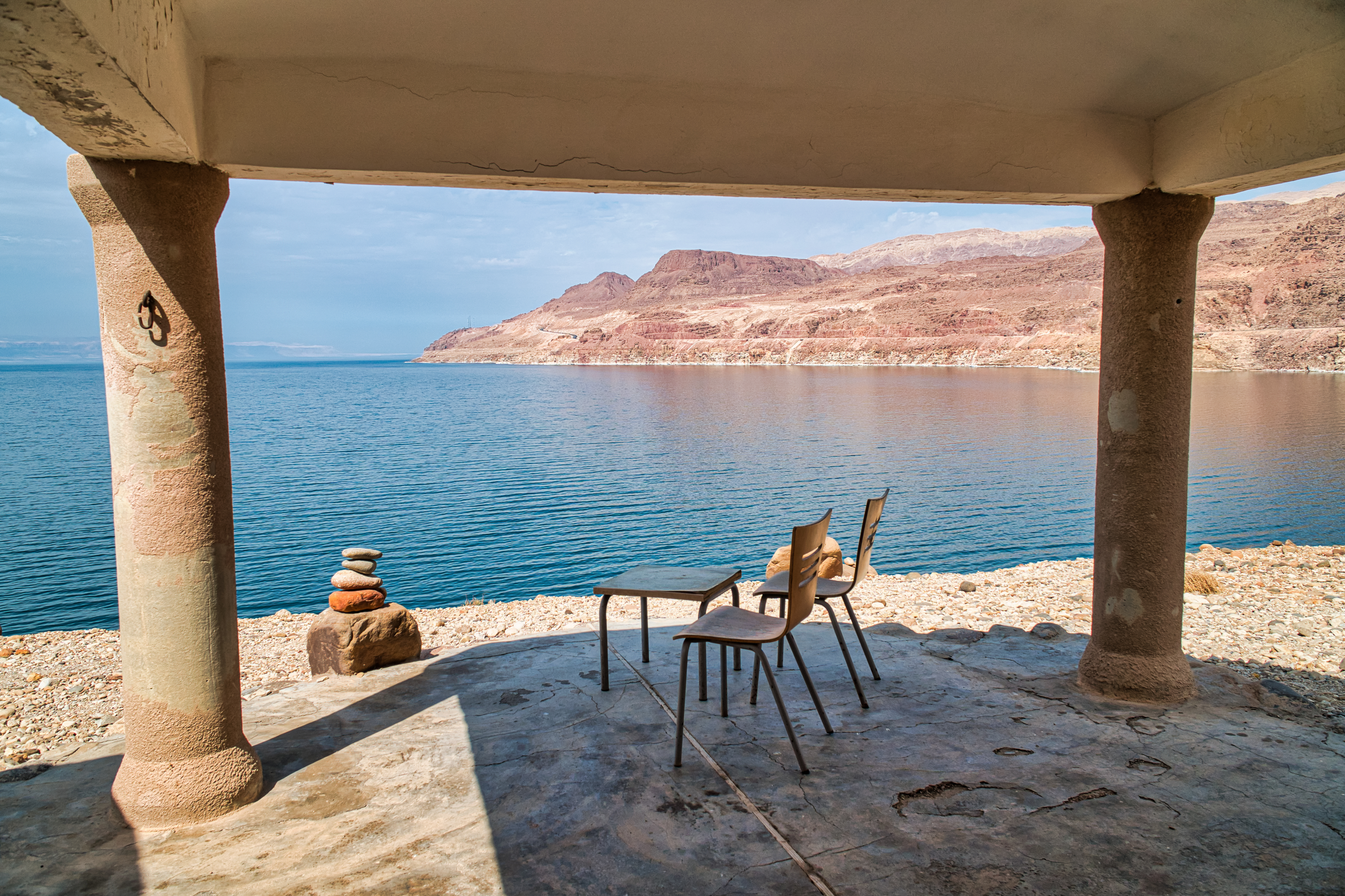 Chairs overlooking the Dead Sea and mountains in Jordan