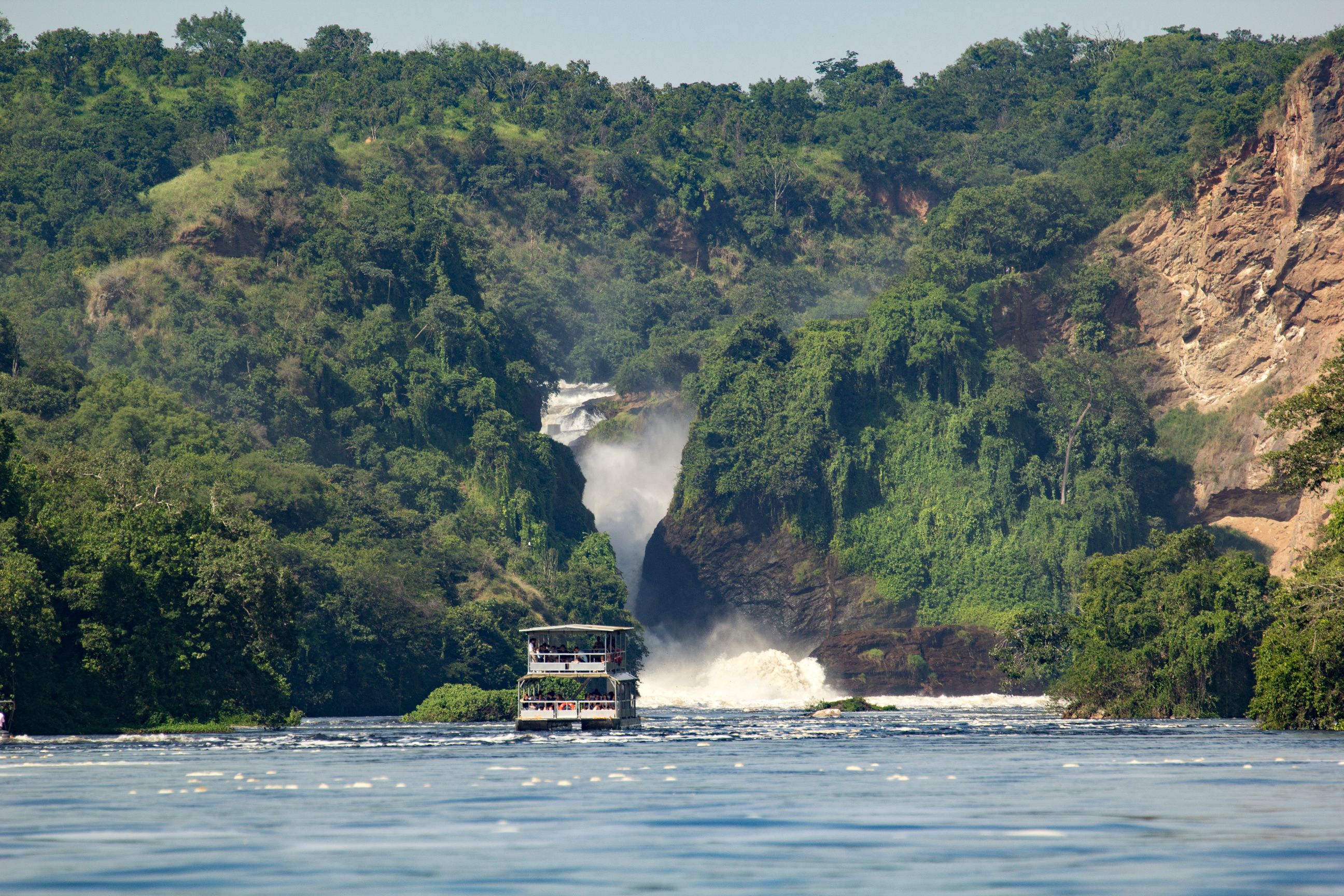 Tourist boat on Nile approaching Murchison Falls, Uganda