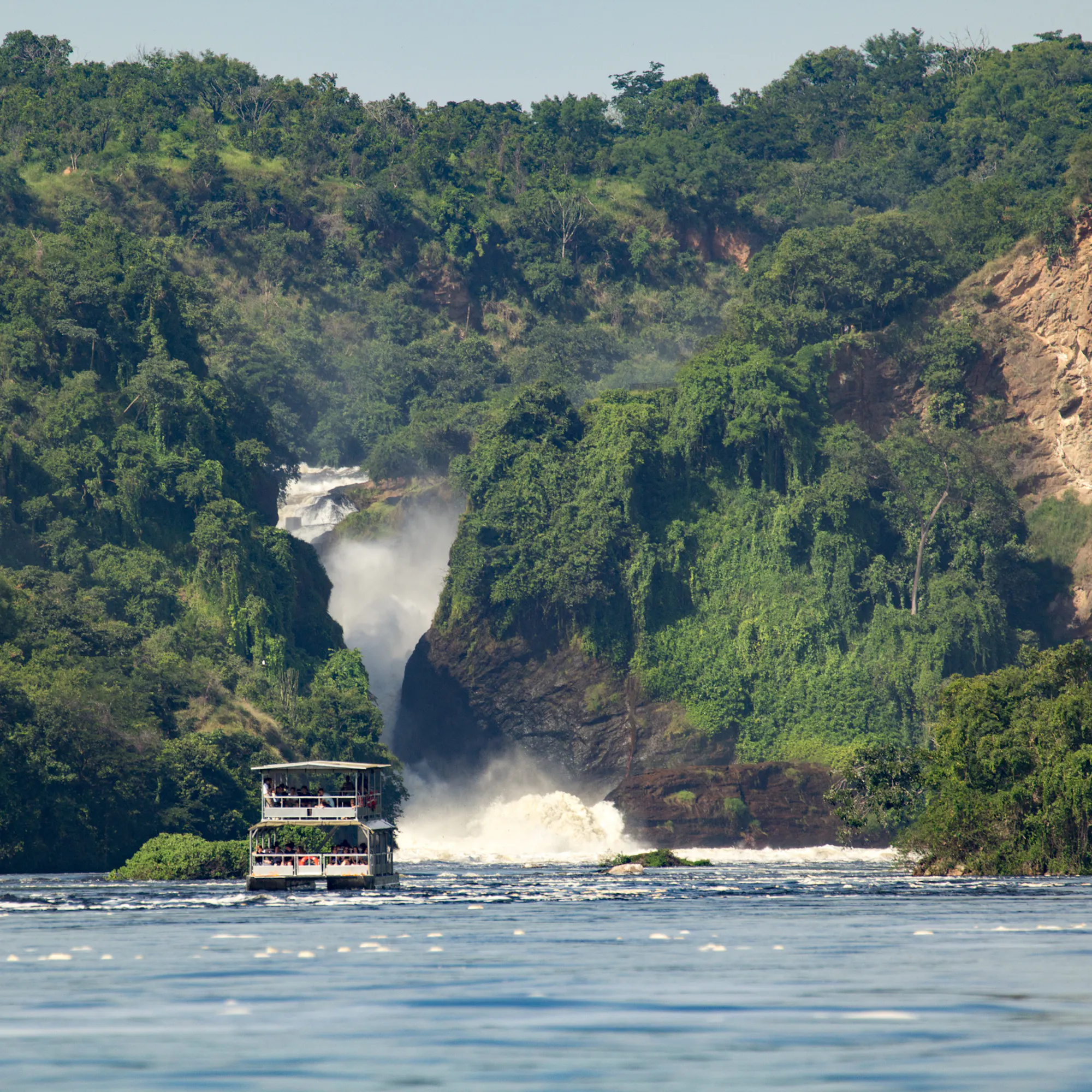 Tourist boat on Nile approaching Murchison Falls, Uganda