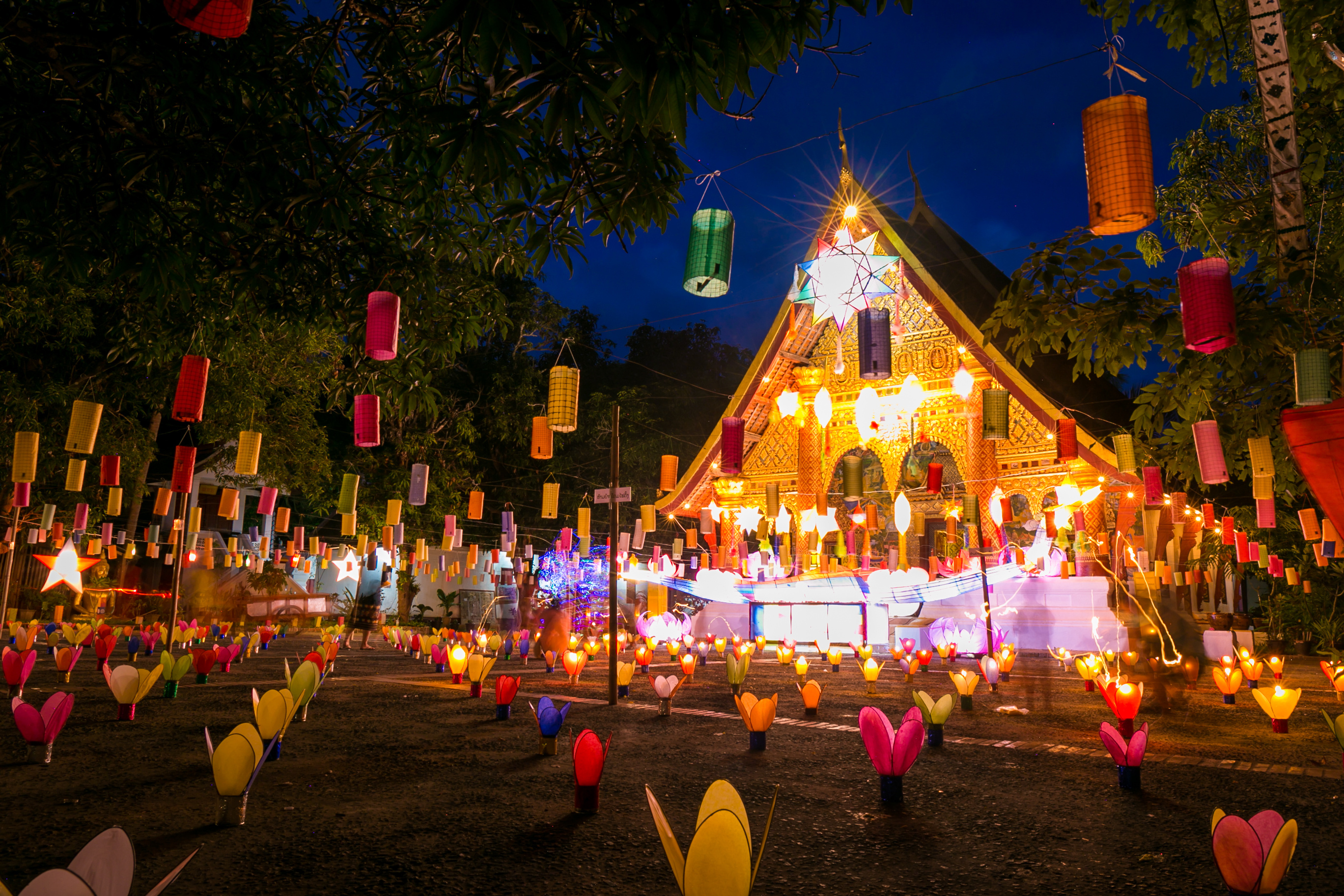 A temple in Laos is illuminated by lanterns during the Festival of Light