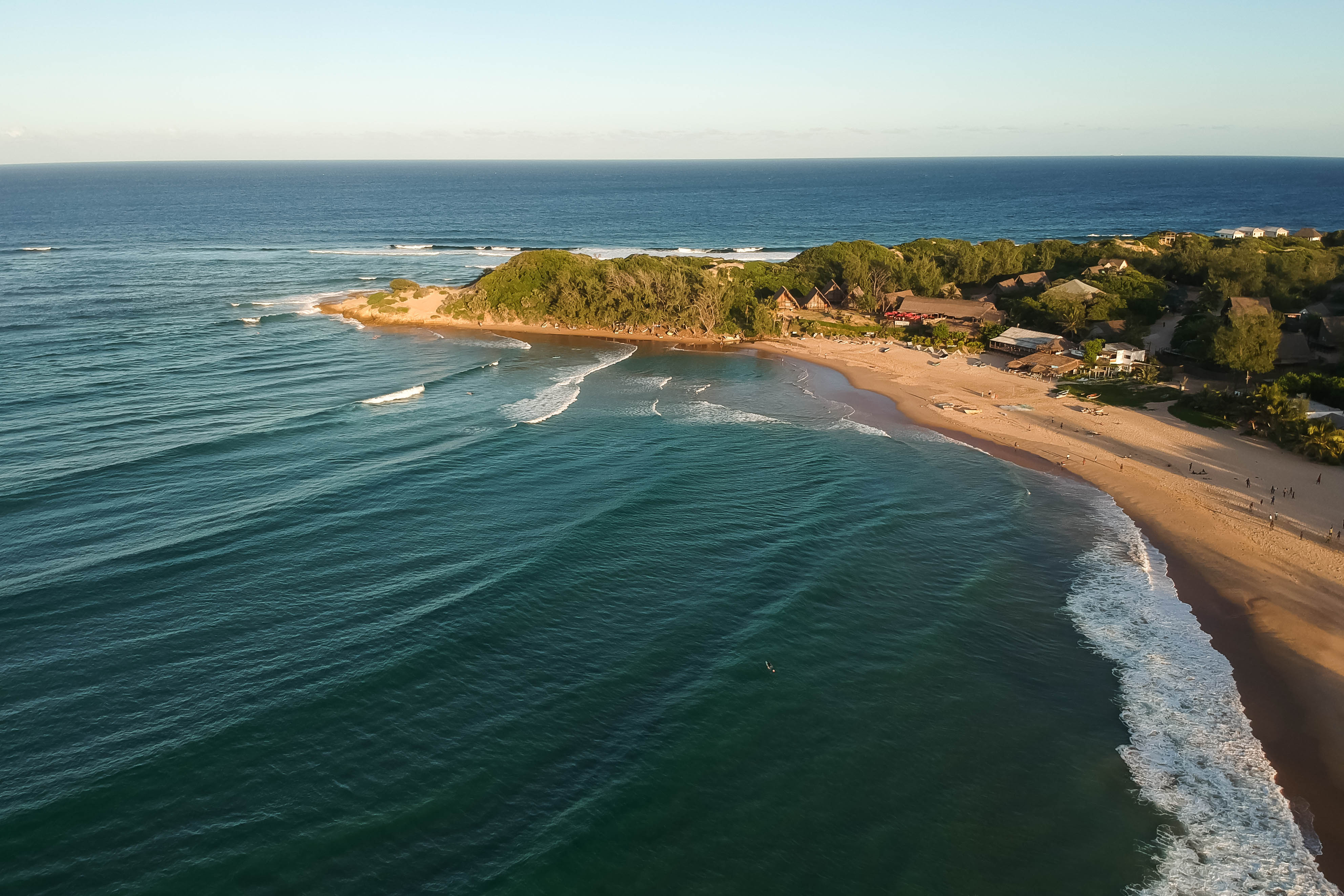 Aerial view of a beachfront lodge and surf breaks in Inhambane, Mozambique
