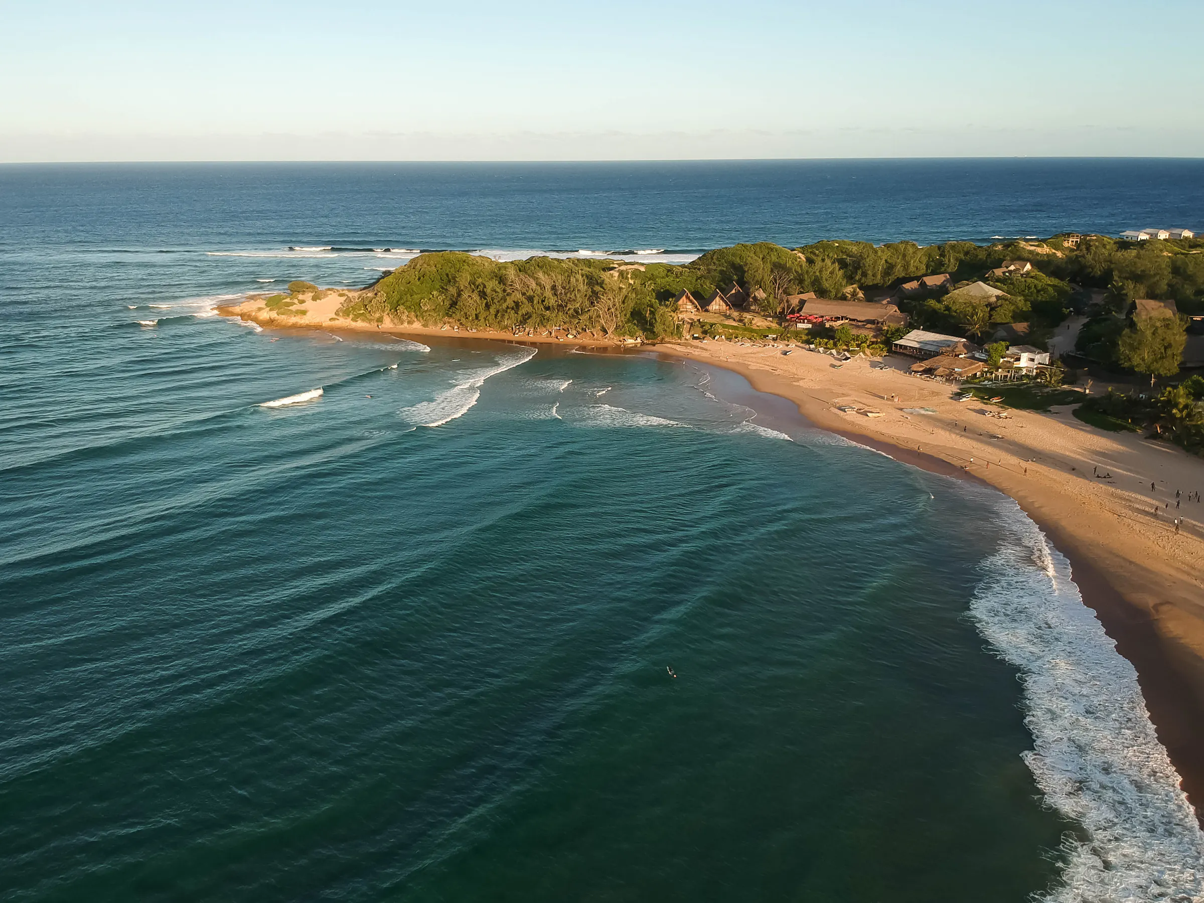 Aerial view of a beachfront lodge and surf breaks in Inhambane, Mozambique