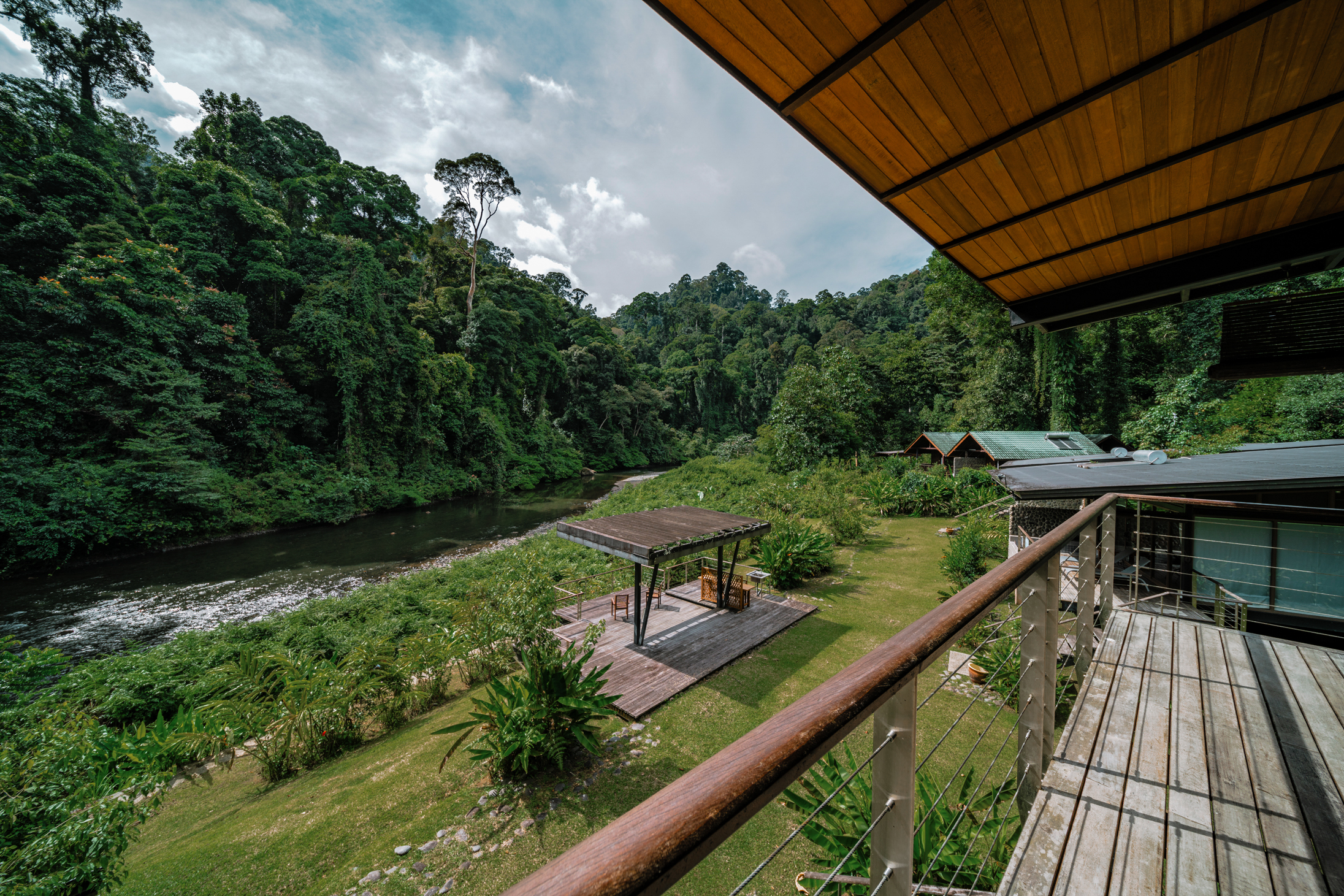 Danum Valley Lodge balcony overlooking river and Borneo rainforest