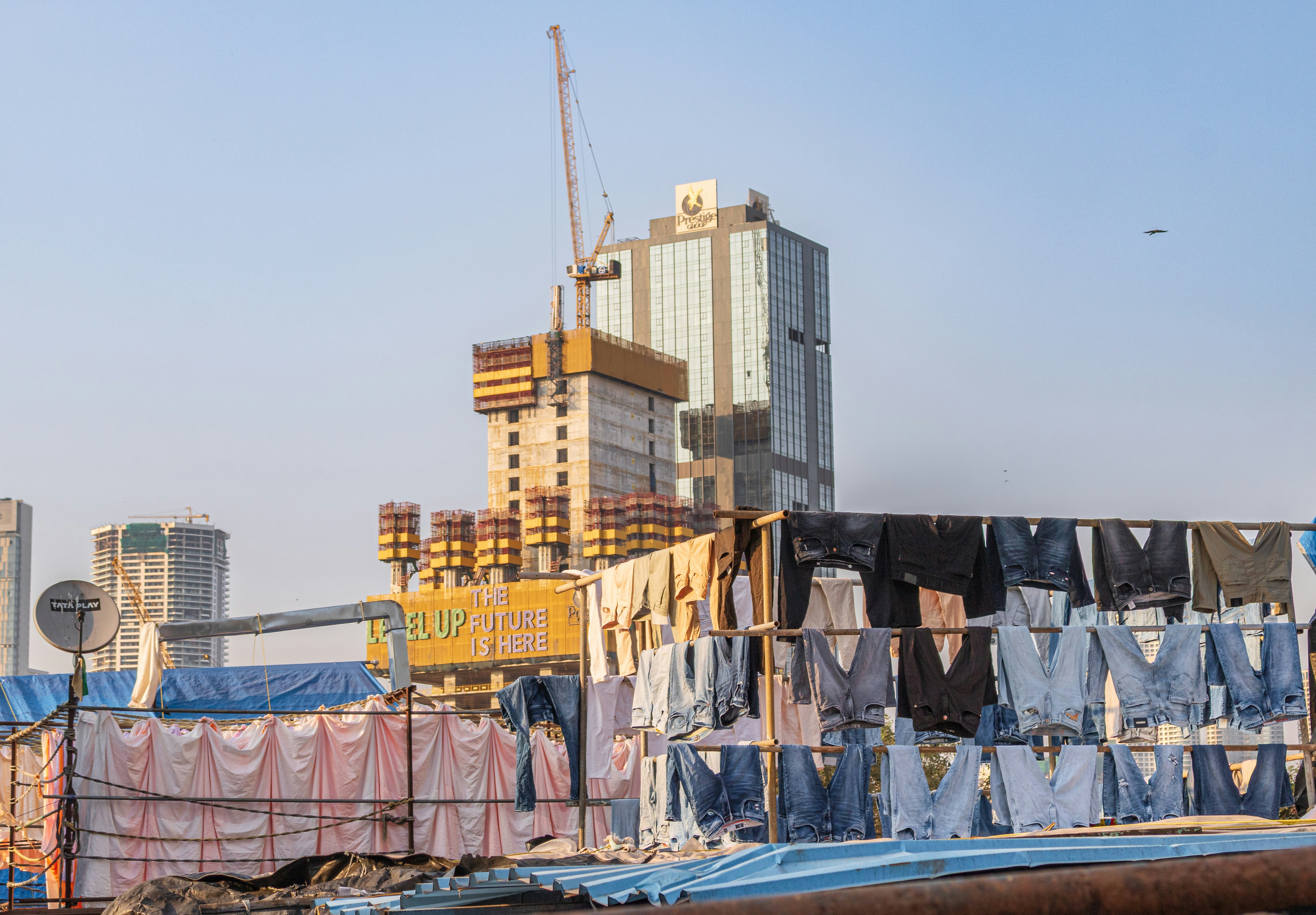 Dhobi Ghat open-air laundry with Mumbai skyscrapers, India