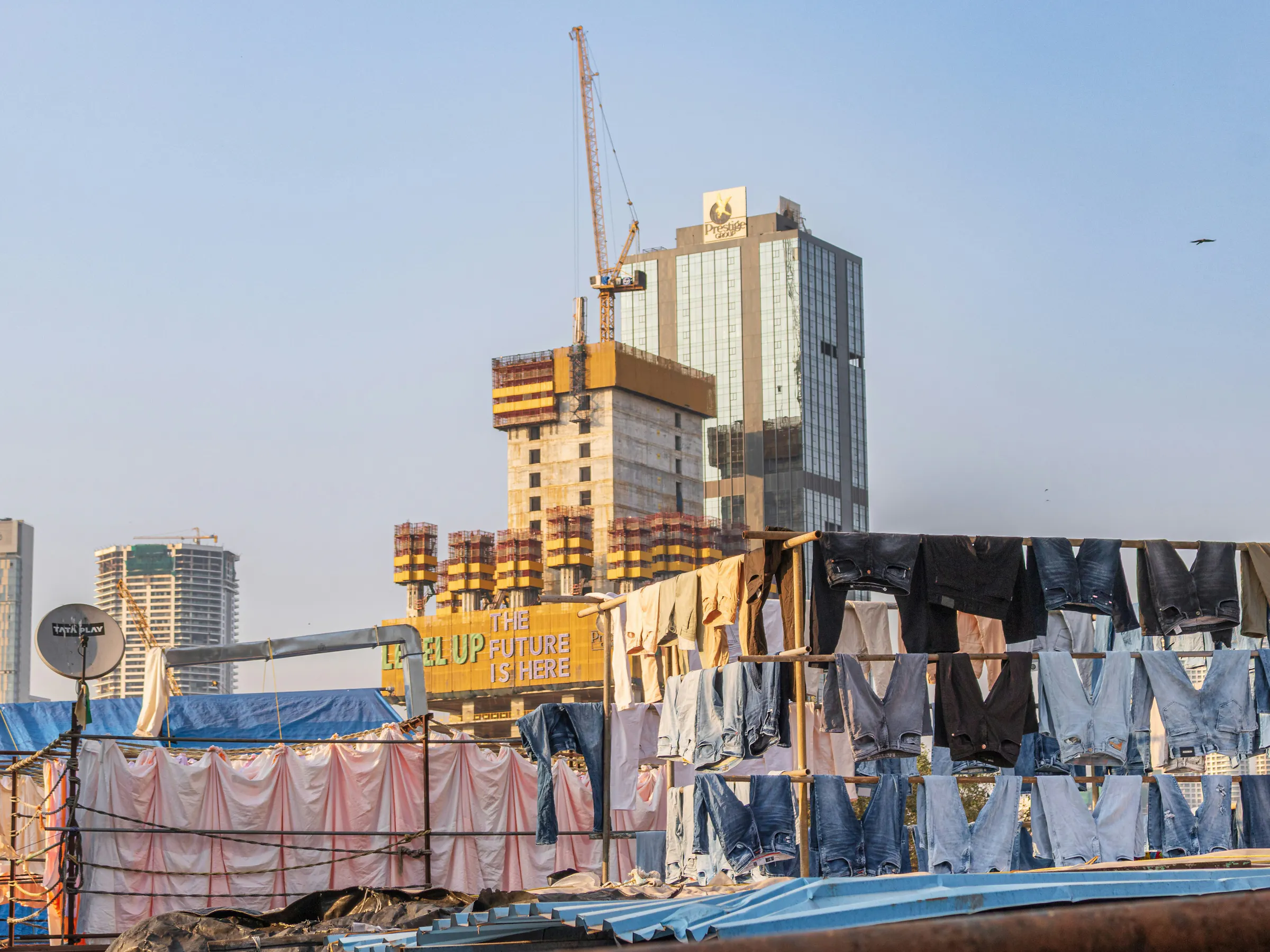 Dhobi Ghat open-air laundry with Mumbai skyscrapers, India