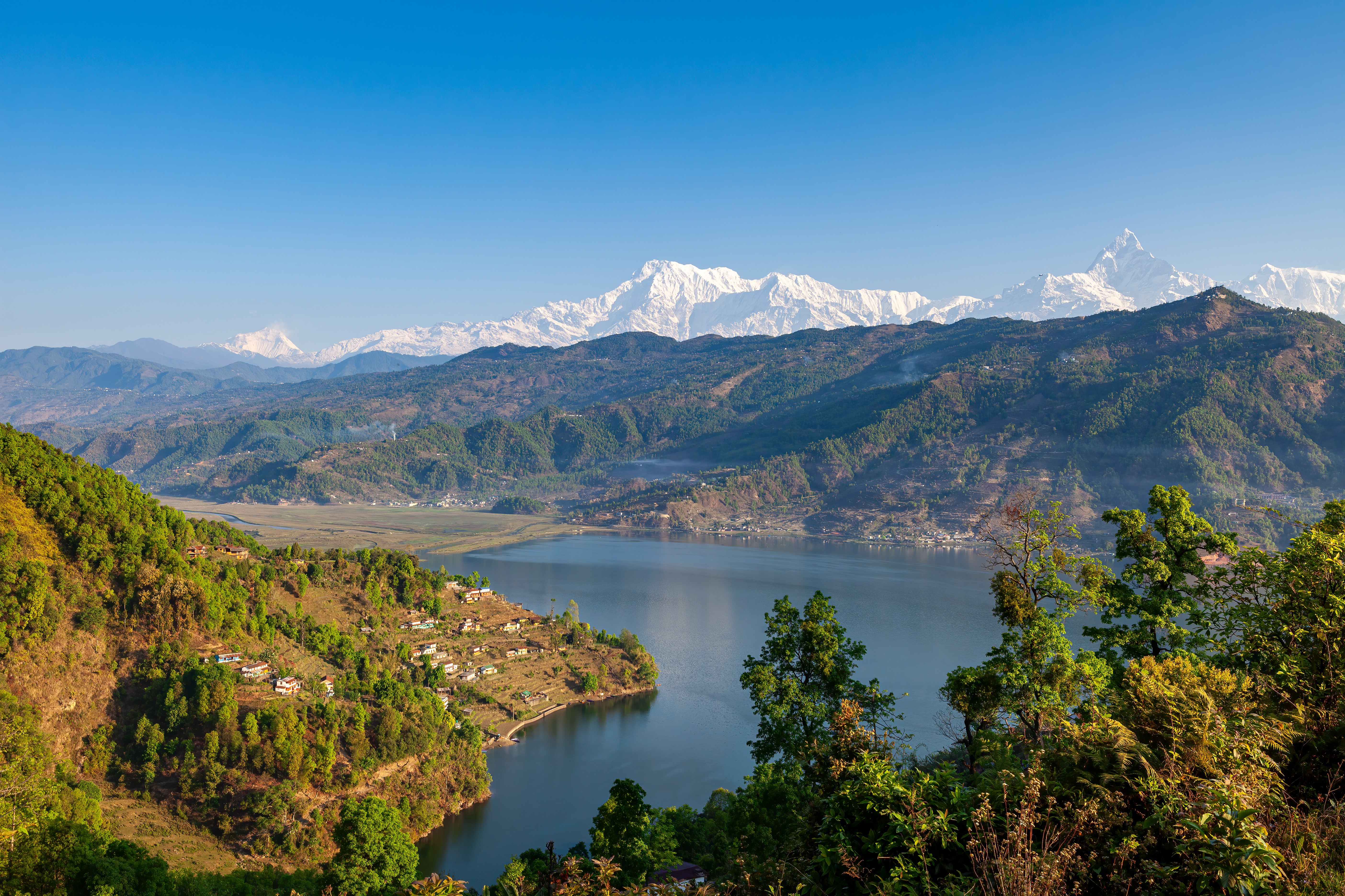 Phewa Lake with snow-capped Annapurna and Machhapuchhre, Pokhara Nepal