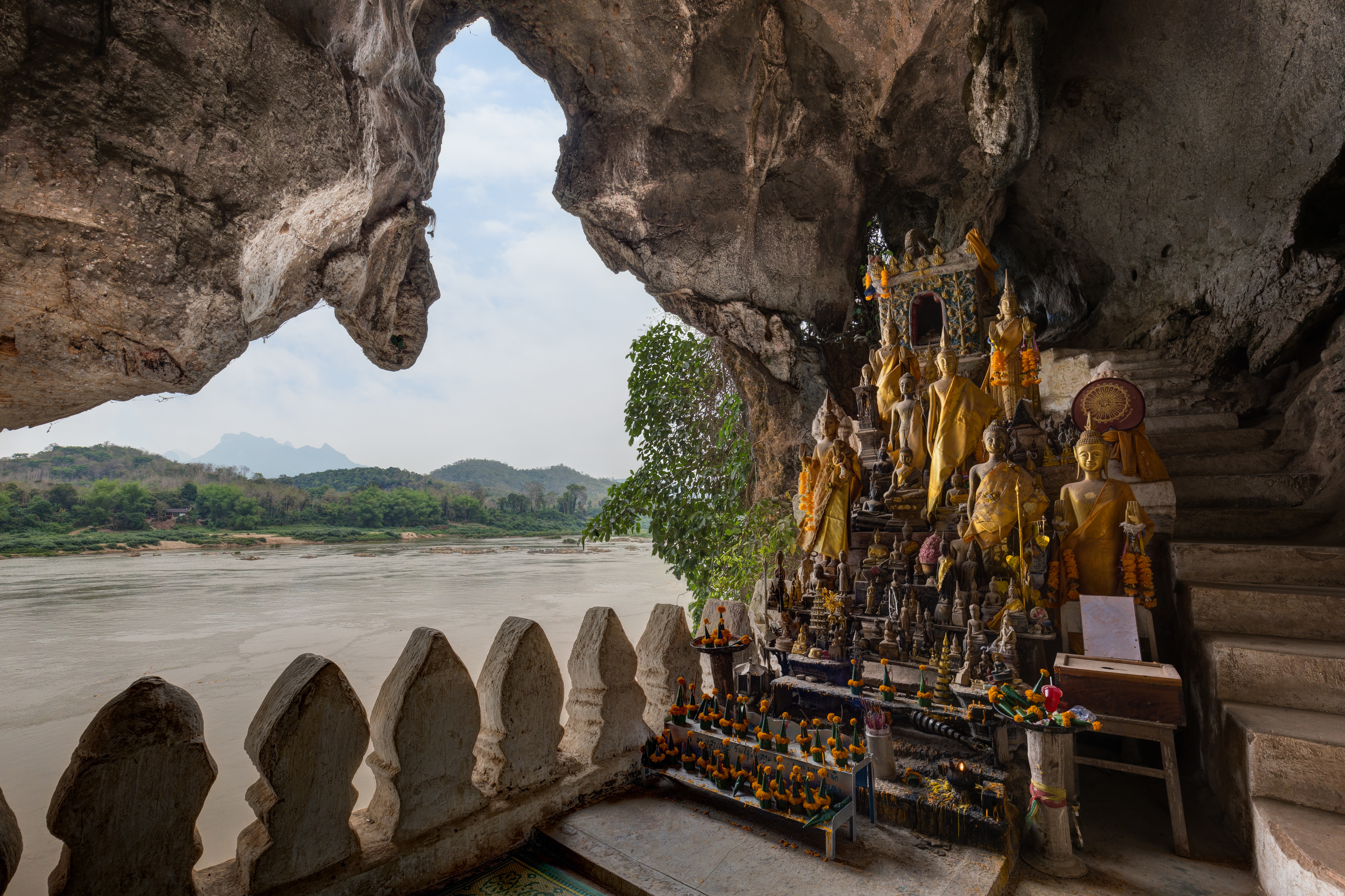 Golden Buddha statues in Pak Ou Caves, Luang Prabang Laos
