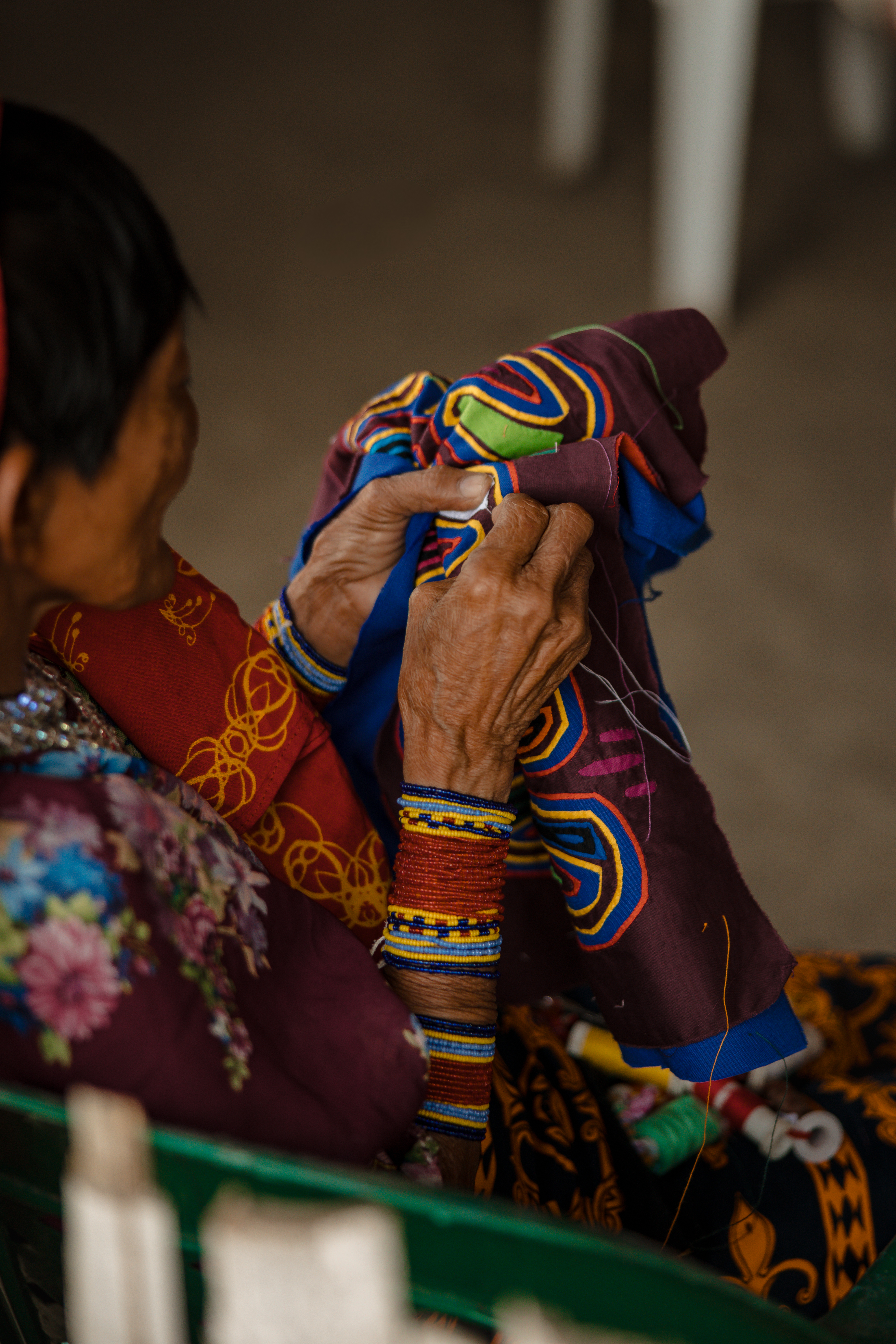 woman crafting traditional clothing 
