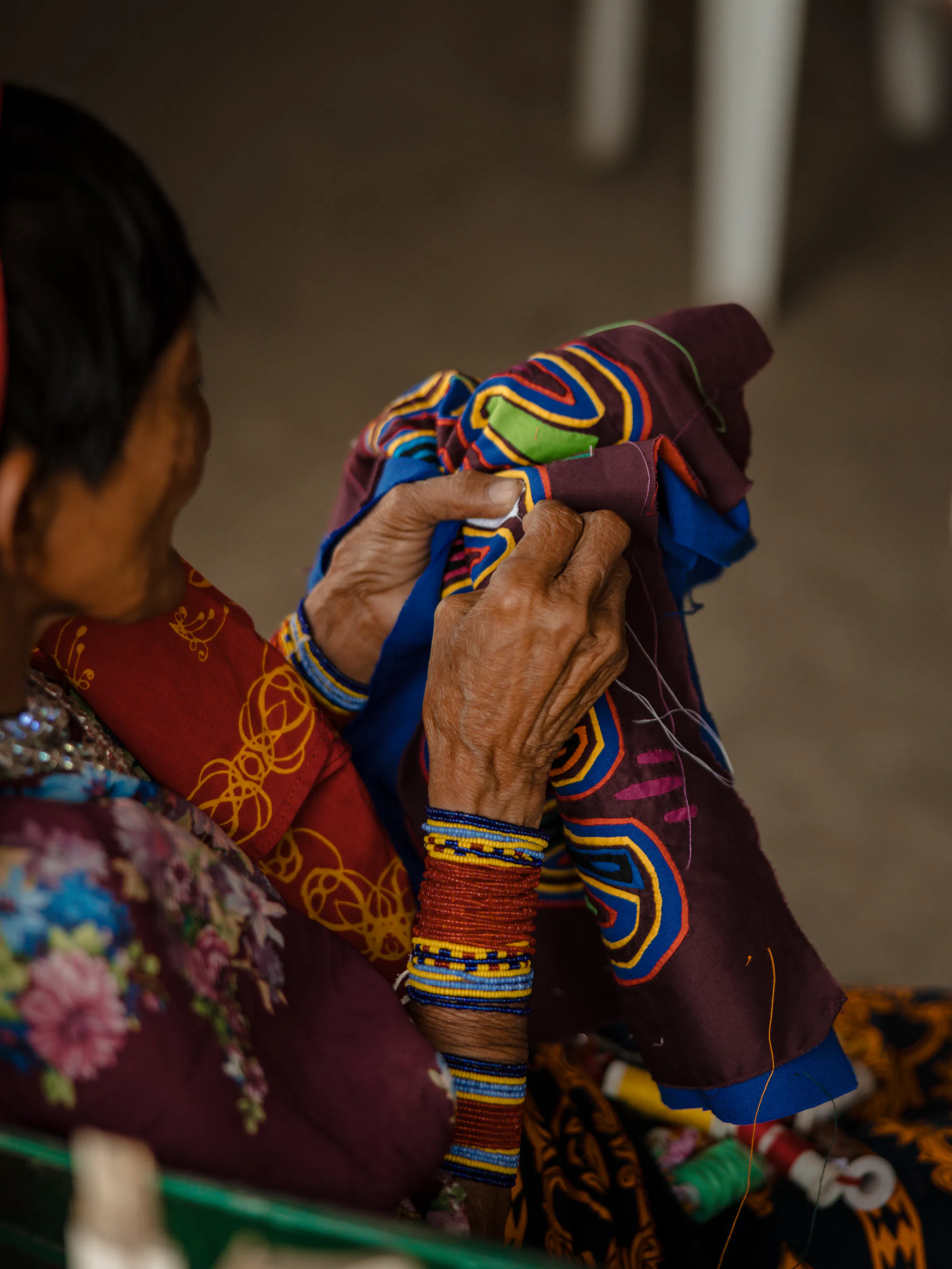 woman crafting traditional clothing