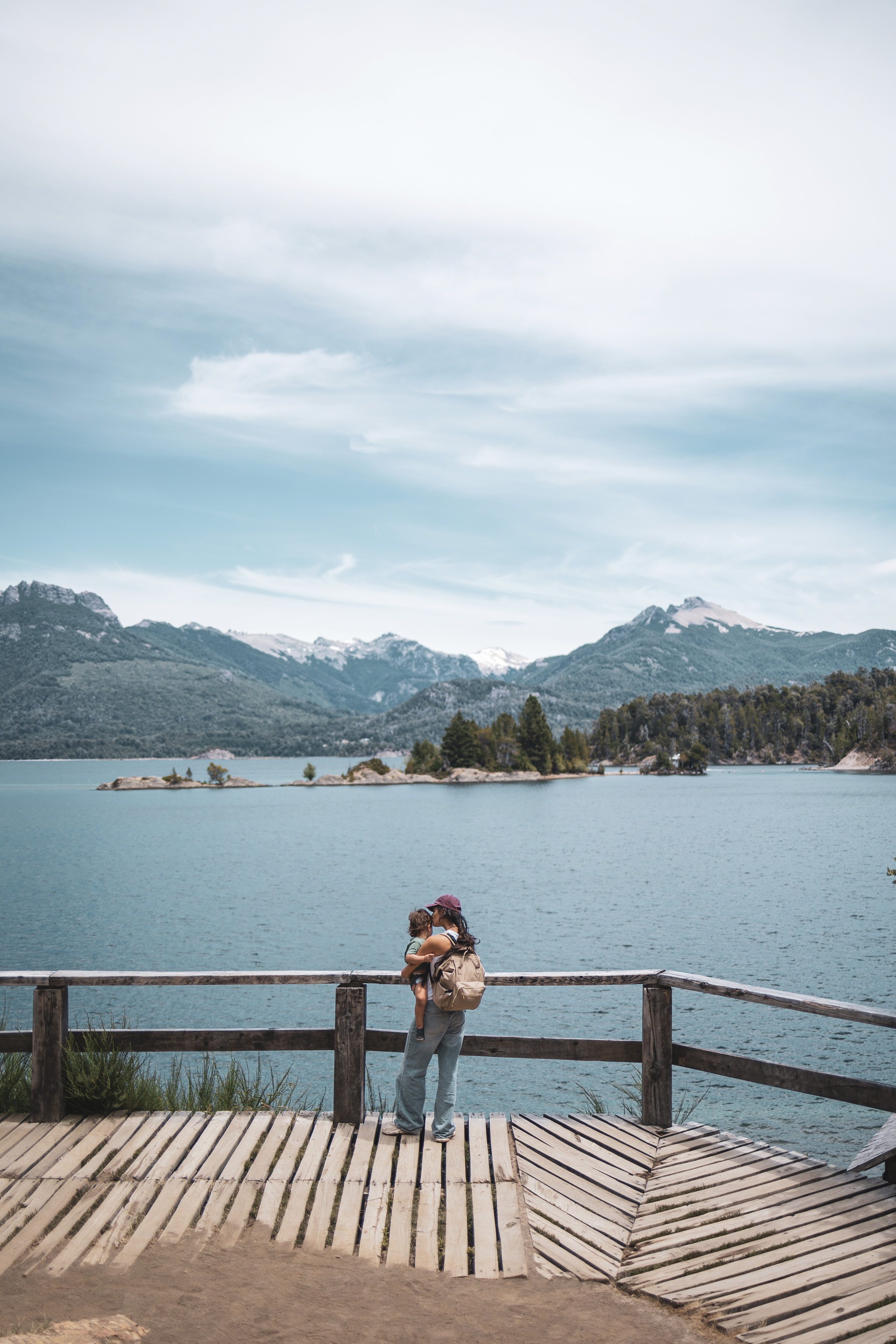 Family enjoying Nahuel Huapi lake view, Bariloche Argentina