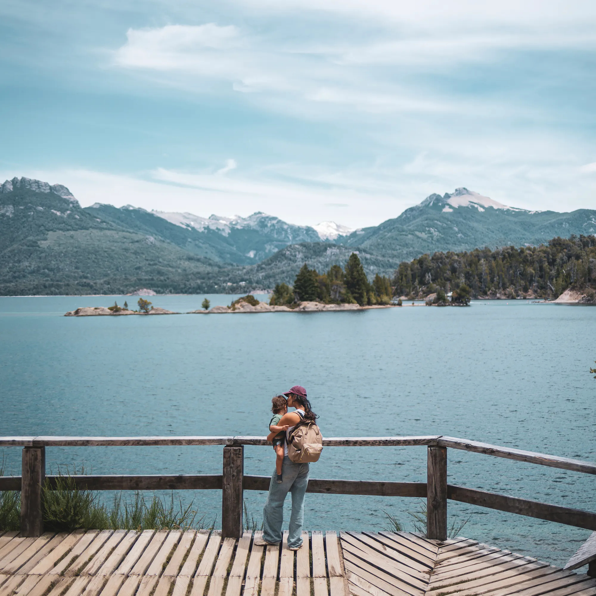 Family enjoying Nahuel Huapi lake view, Bariloche Argentina