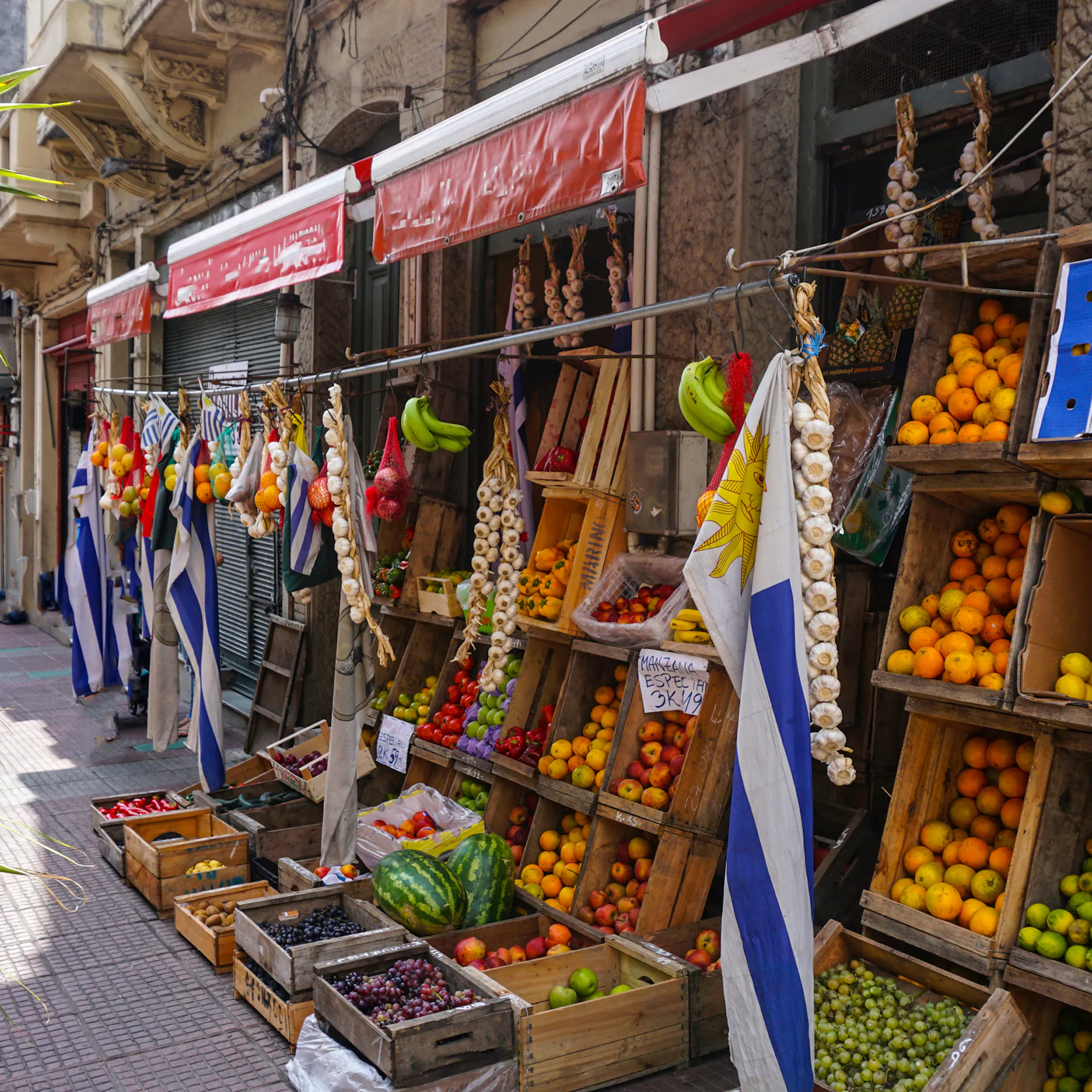 Fresh fruit stand with Uruguayan flags on a Montevideo street in Uruguay