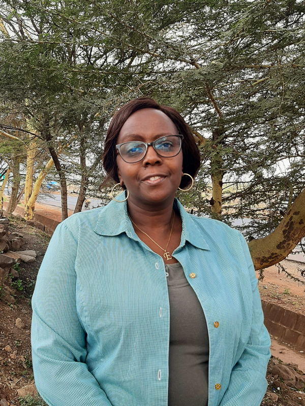 Headshot of Esther Ndirangu, Itinerary Designer at Extraordinary Journeys.