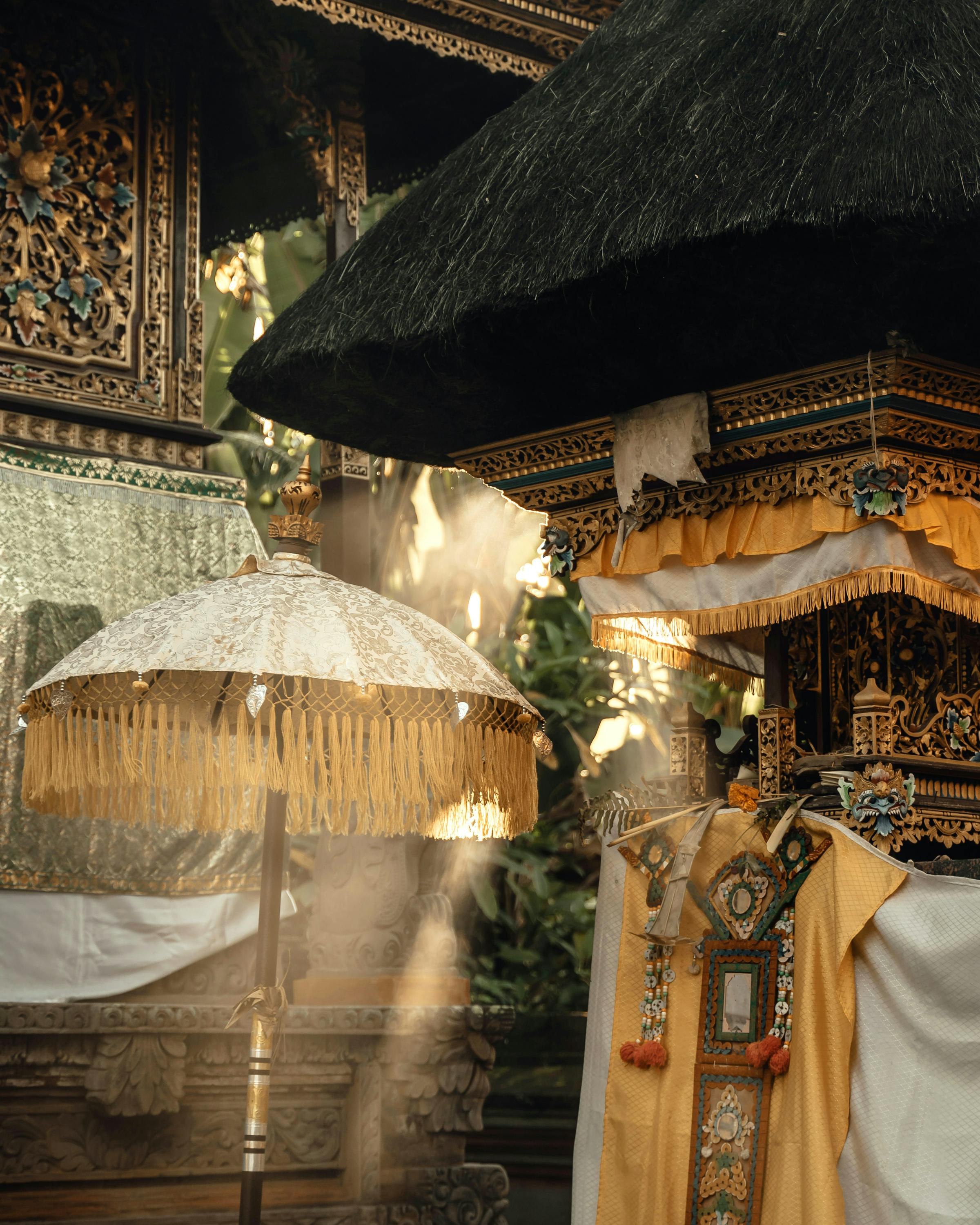 Sunbeams stream into a traditional wooden interior with hanging lanterns.