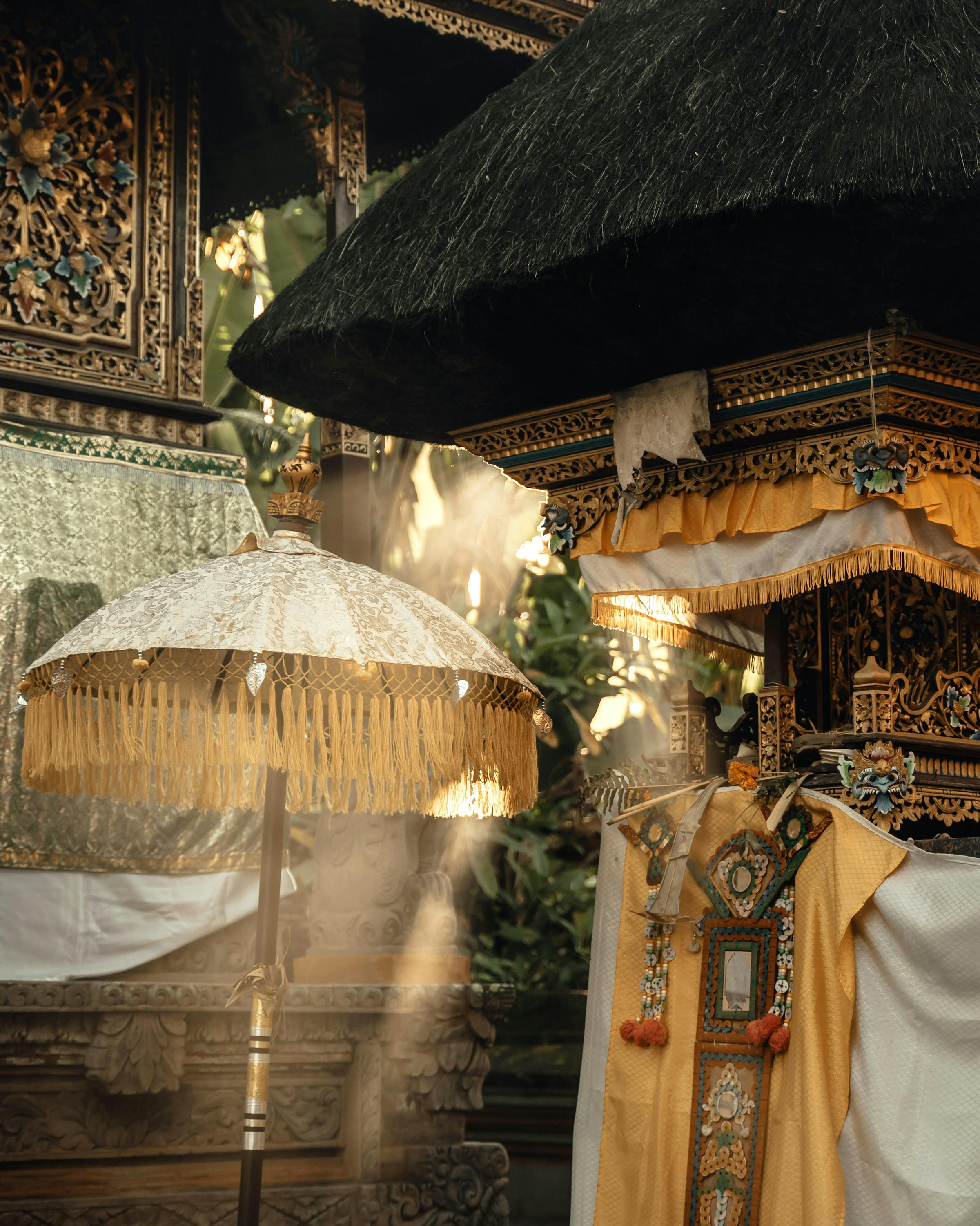 Sunbeams stream into a traditional wooden interior with hanging lanterns.