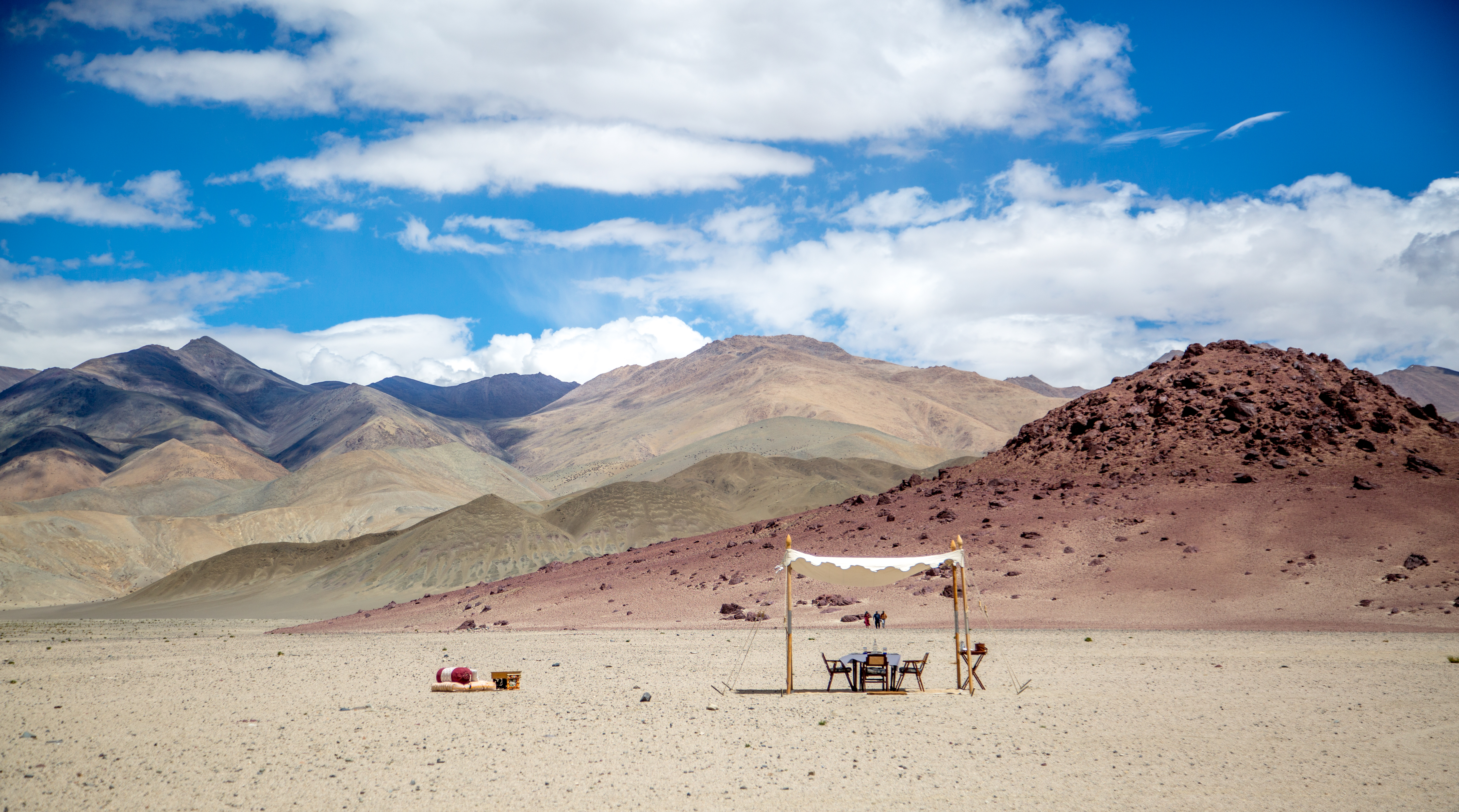 outside table set up with landscape in Thiksey