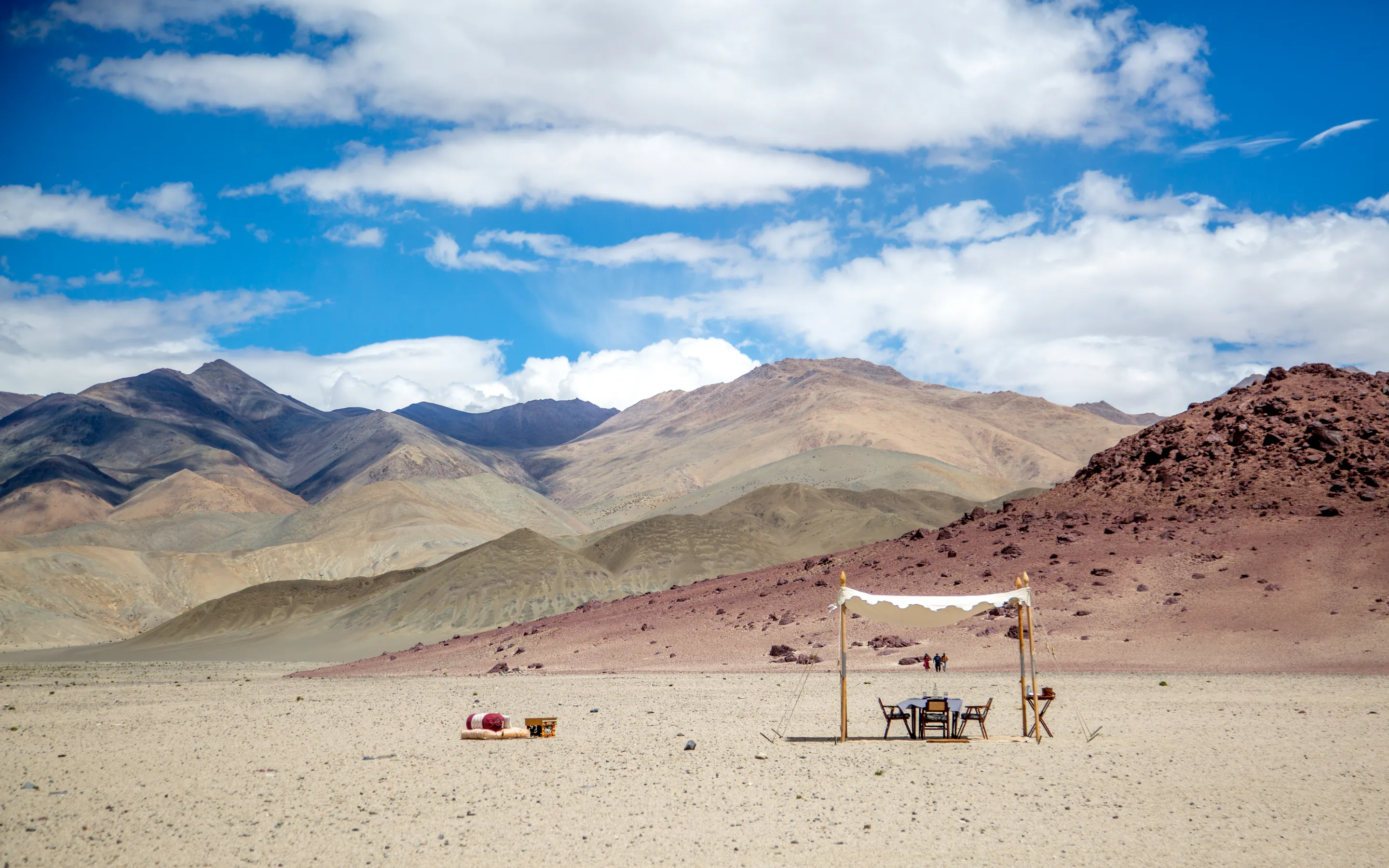 outside table set up with landscape in Thiksey