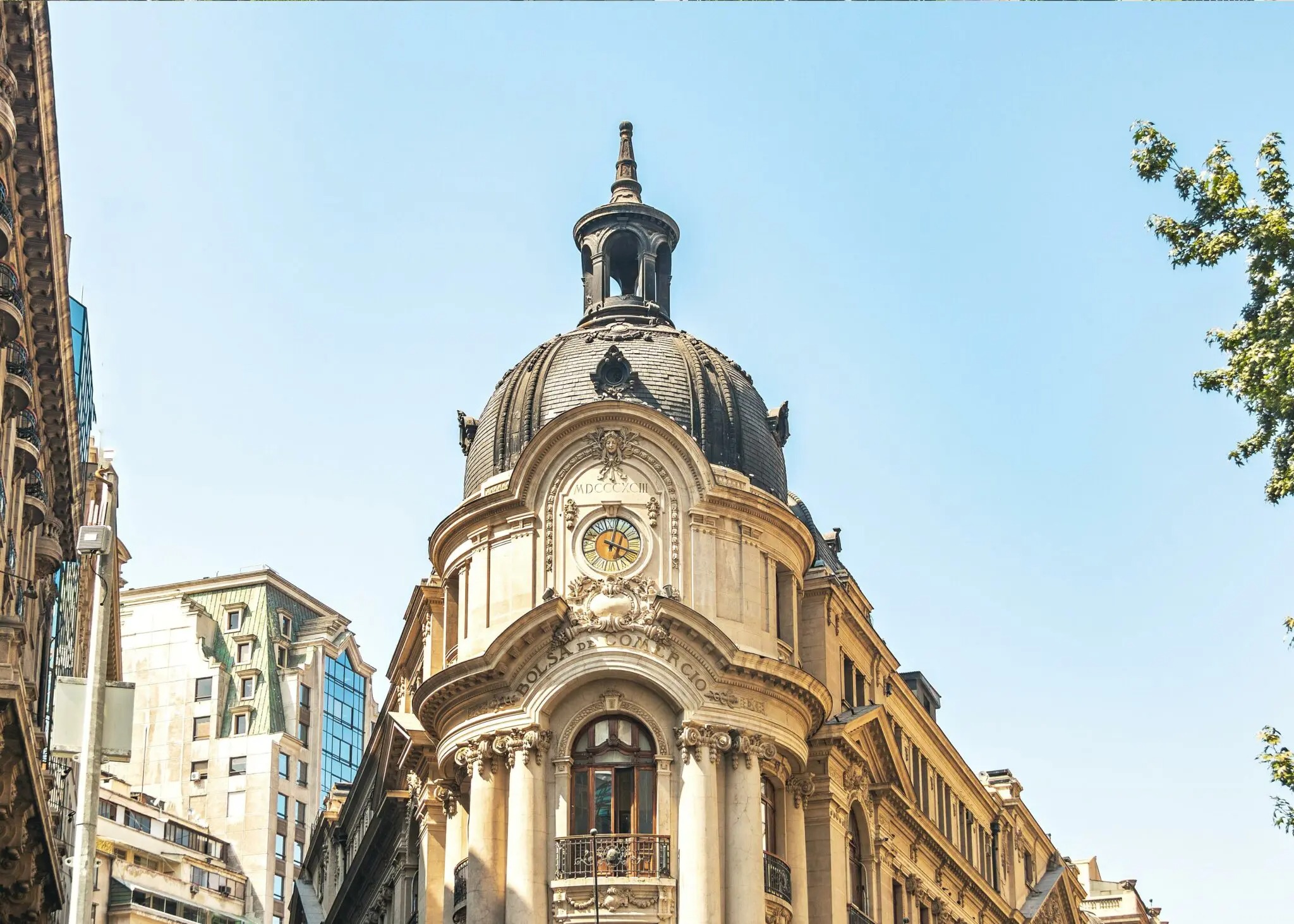 The ornate facade of Santiago's stock exchange rises above the street under a clear blue sky in central Chile.