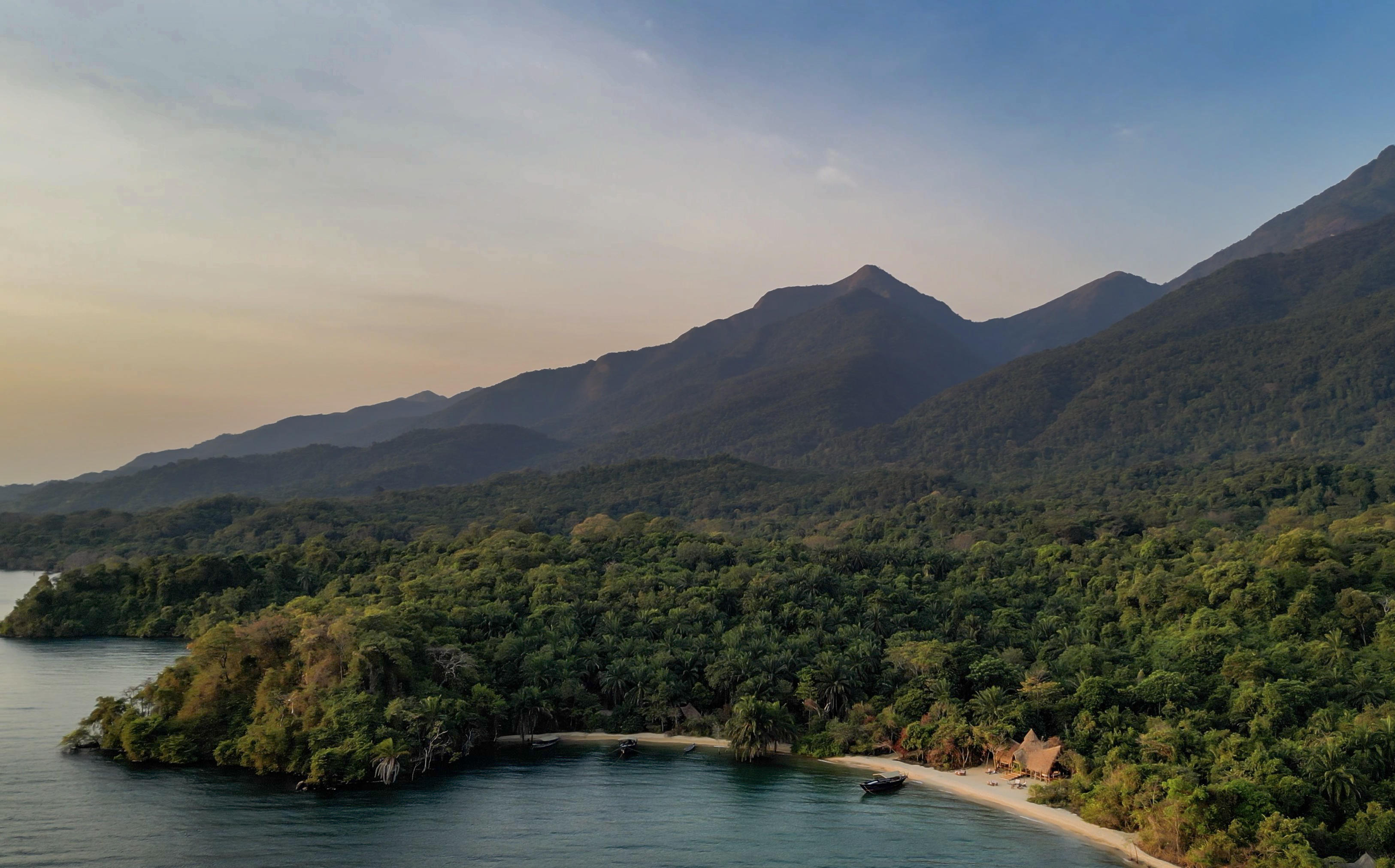 Aerial view of the Greystoke Mahale camp on a jungle promontory beside Lake Tanganyika.