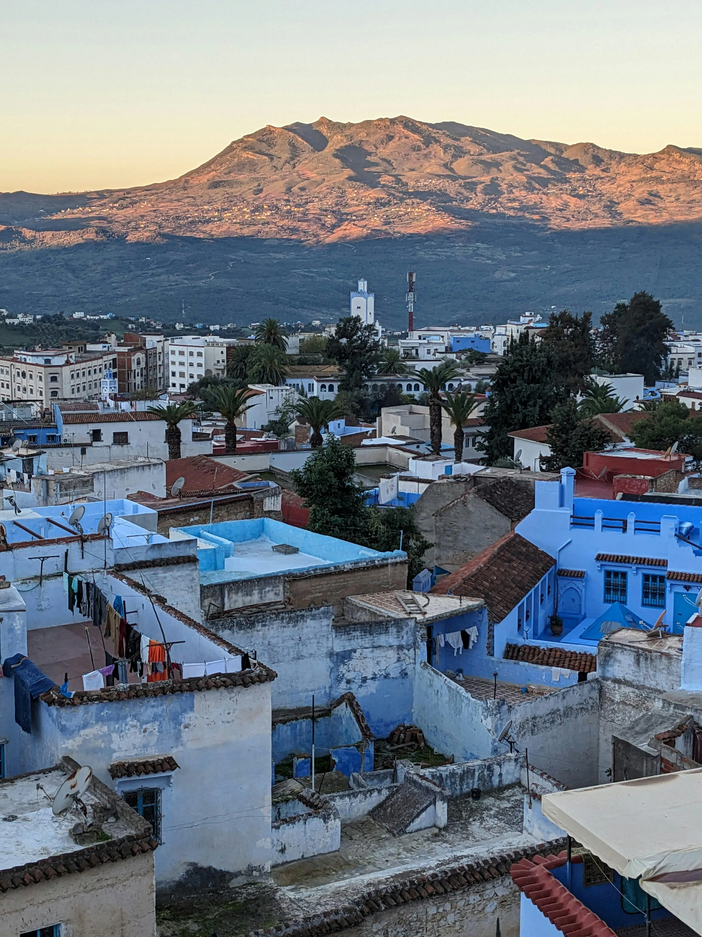 Blue-washed stairways and whitewashed walls line the medina of Chefchaouen in Morocco.