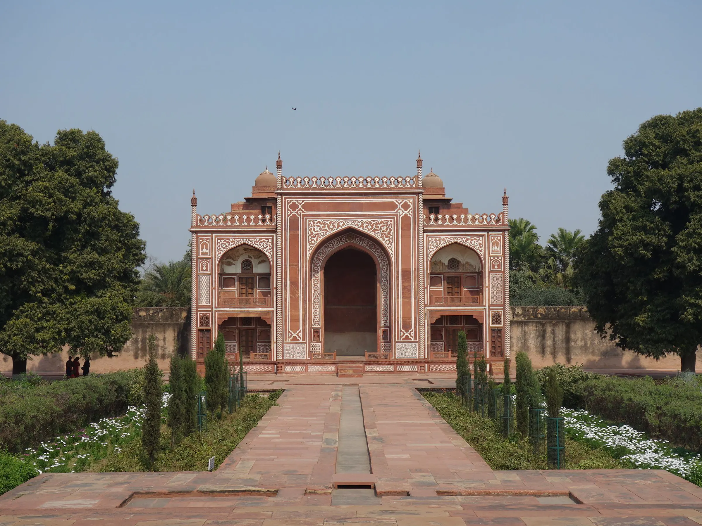 Itmad-ud-Daulah tomb entrance in Agra, India featuring red sandstone and white marble inlay architecture