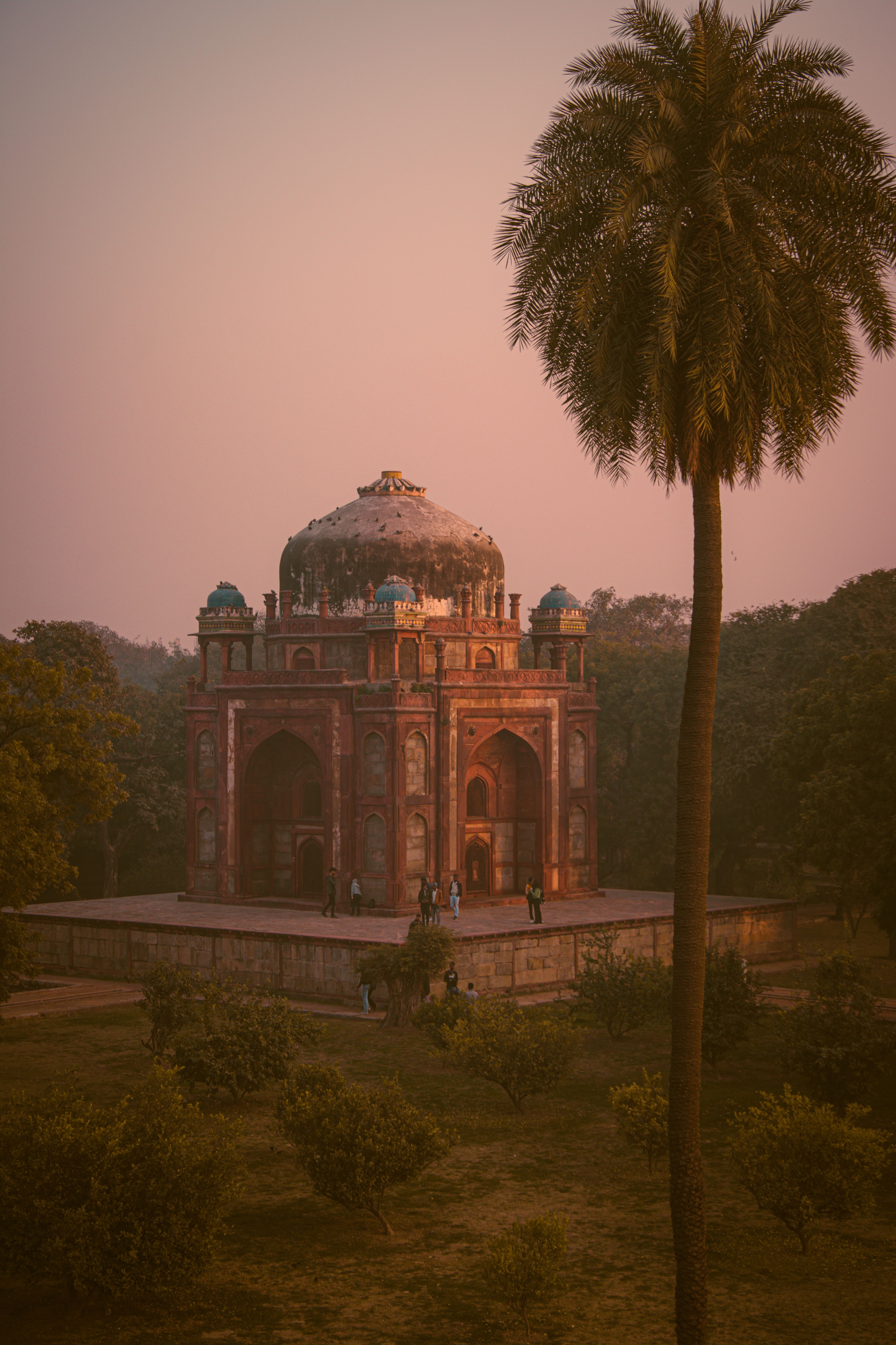 Mughal-era domed tomb at sunset in Delhi, India