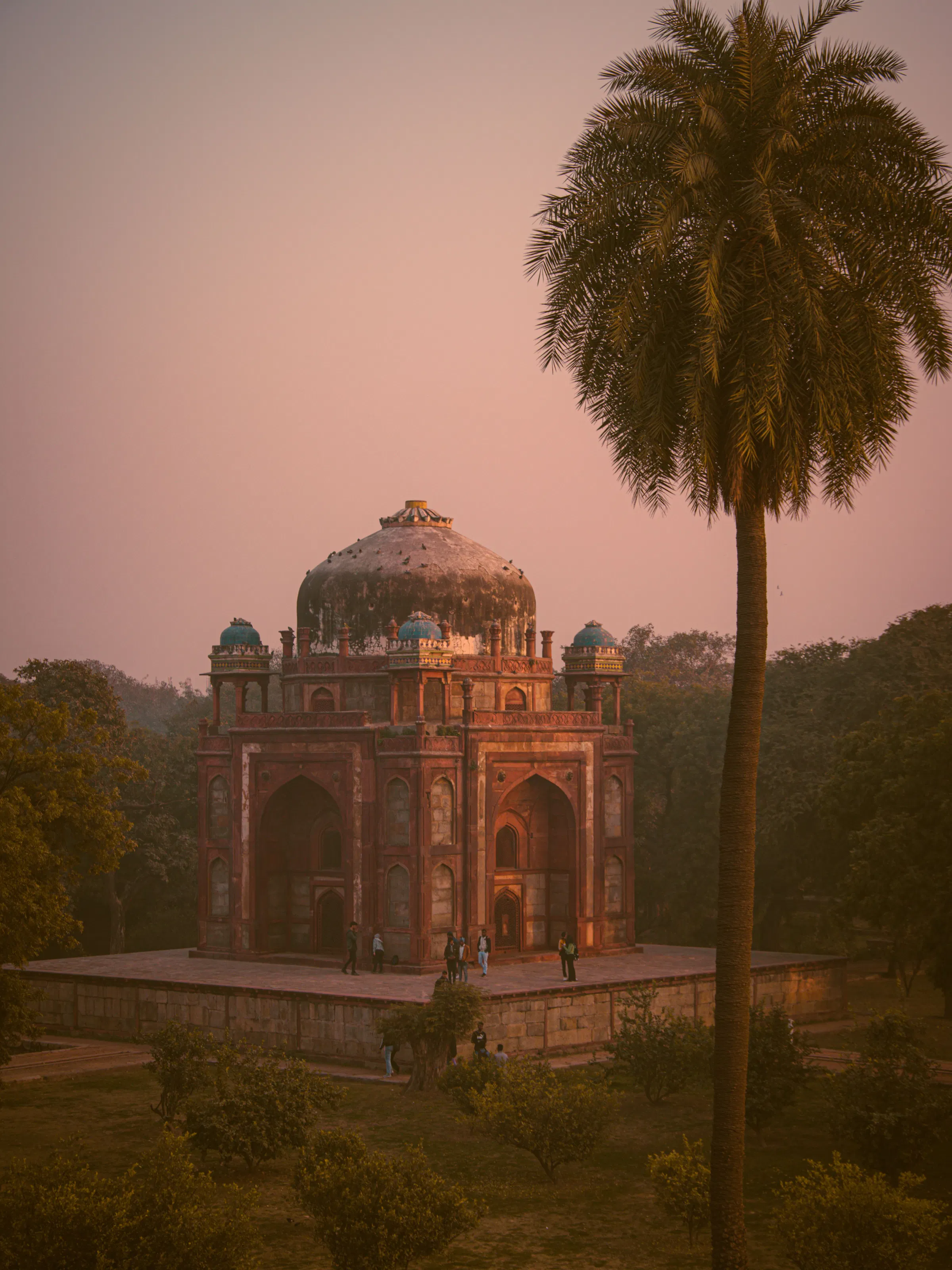 Mughal-era domed tomb at sunset in Delhi, India