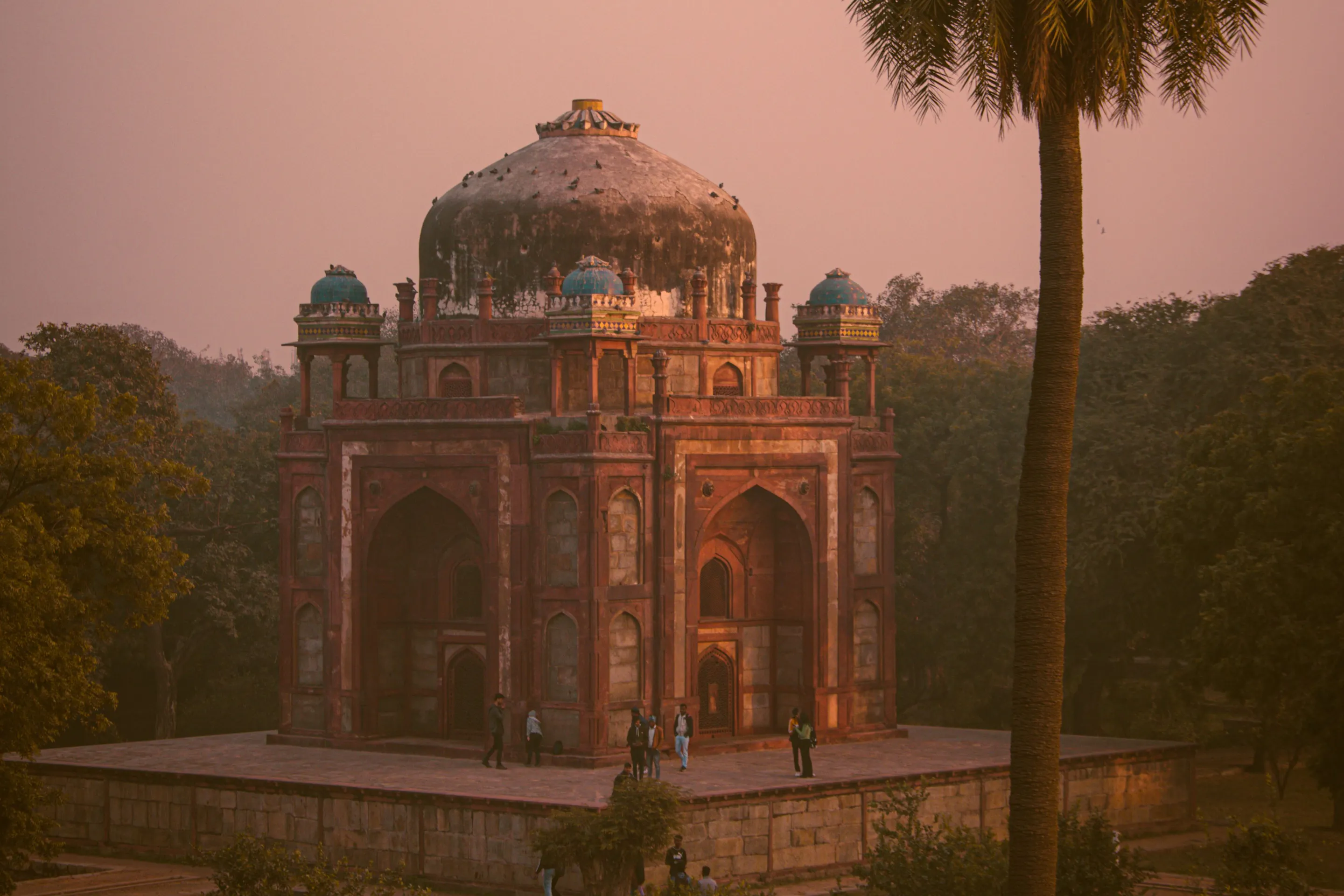 Mughal-era domed tomb at sunset in Delhi, India