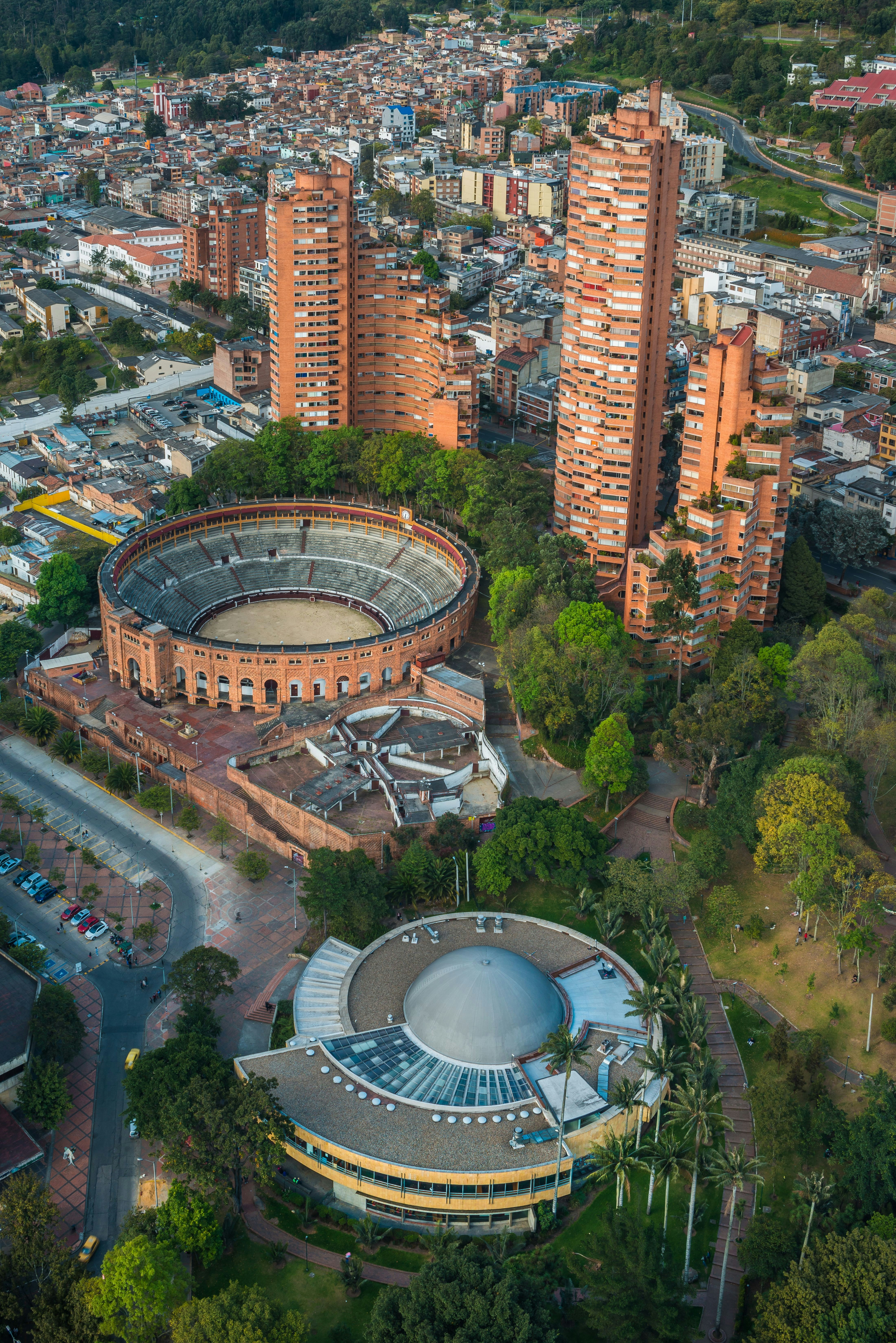 Aerial view of La Santamaría bullring and Torres del Parque towers in Bogotá, Colombia
