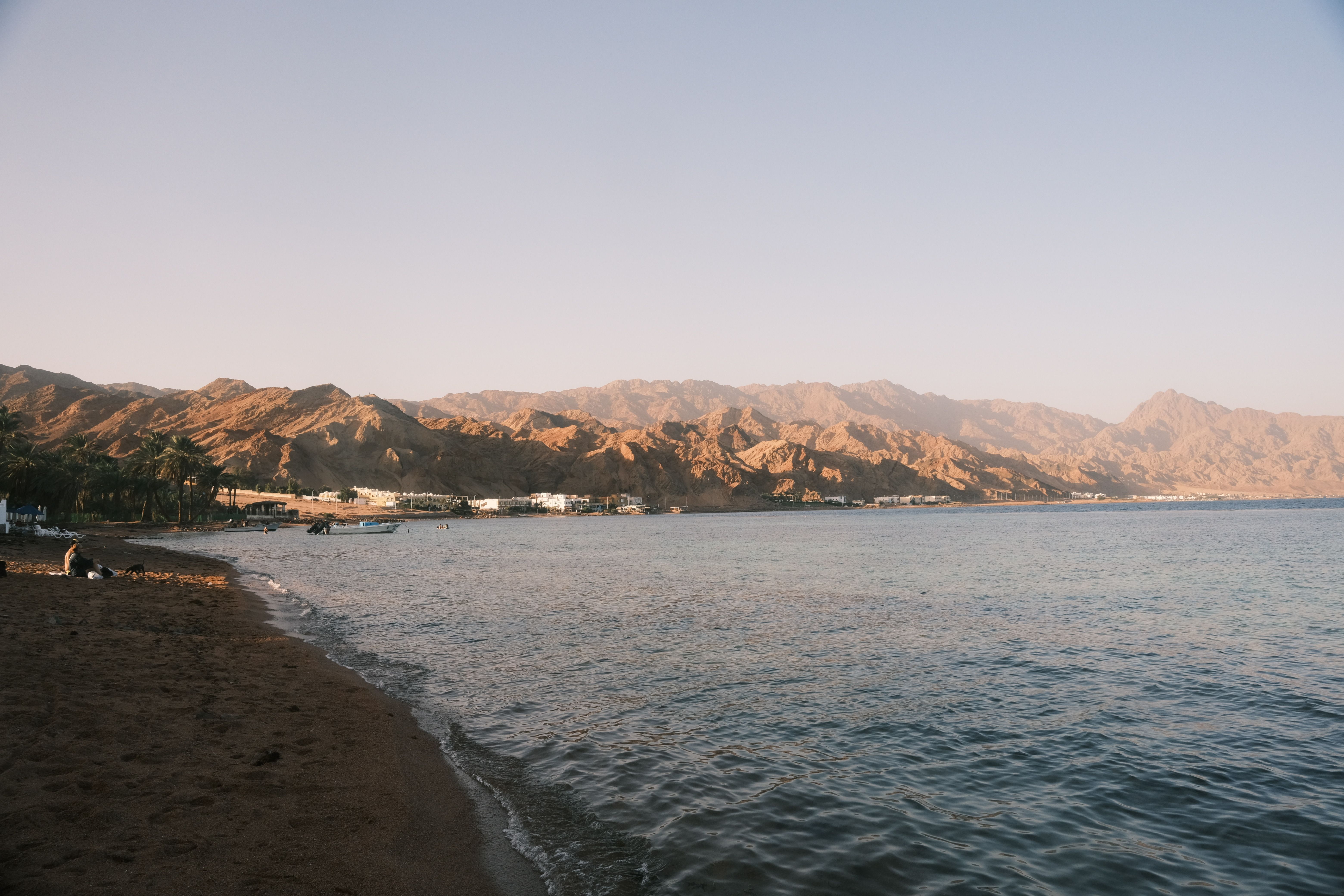 Beach and mountains along a coastal bay in Jordan
